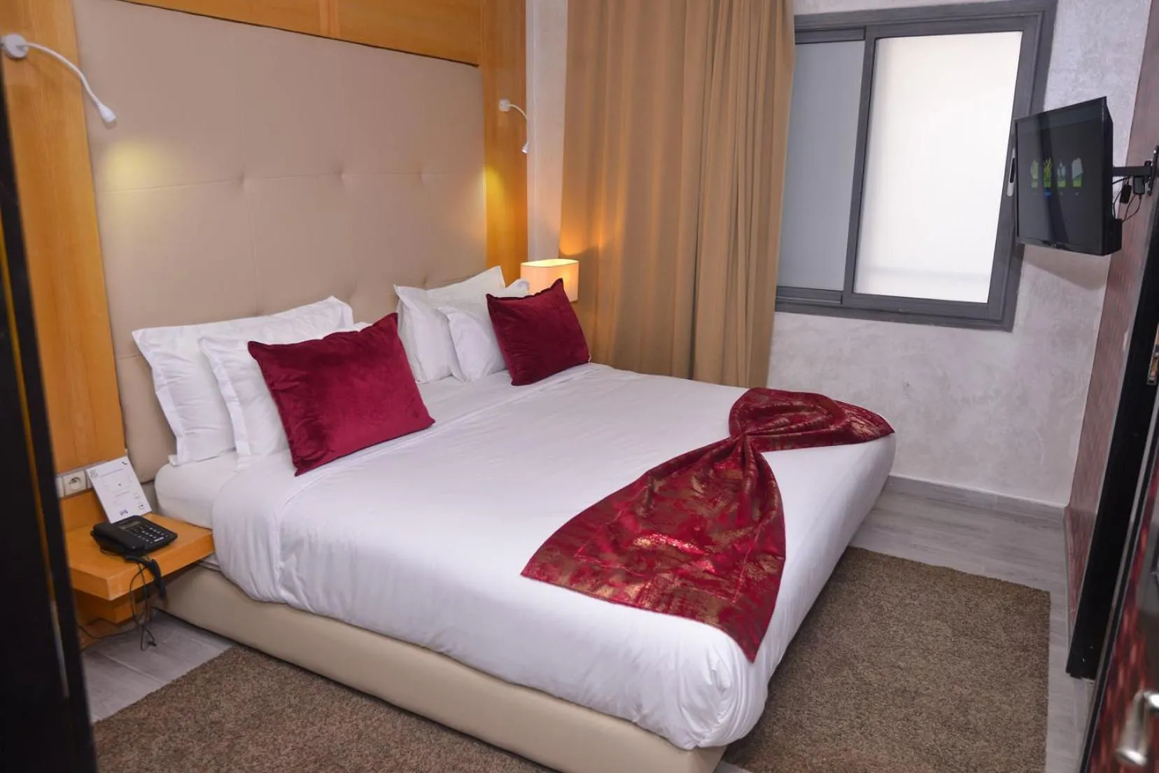 Bed in Le 135 appart hotel