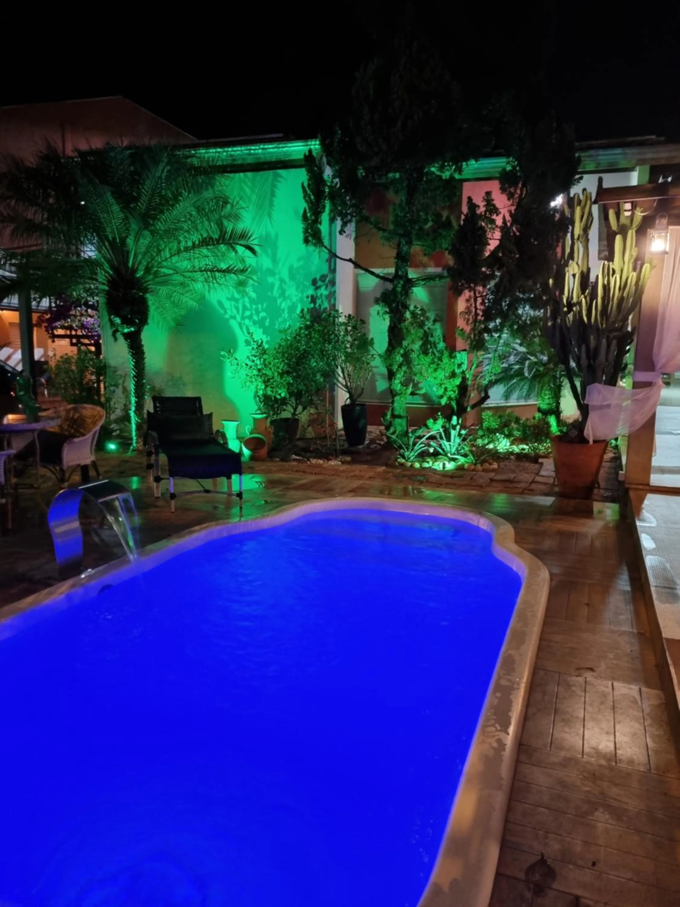 Swimming pool in Pousada das Orquídeas