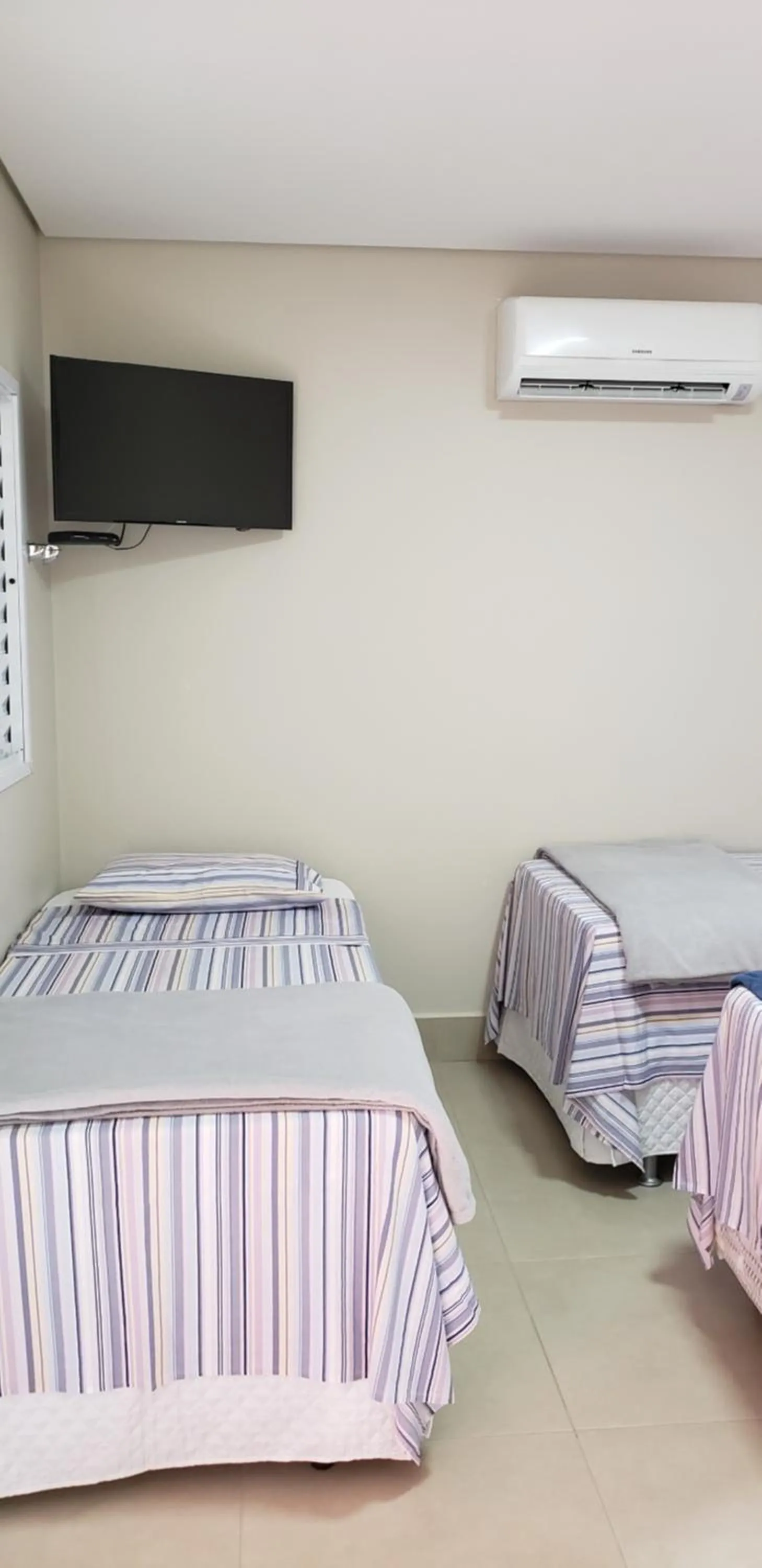 Bed in Pousada das Orquídeas