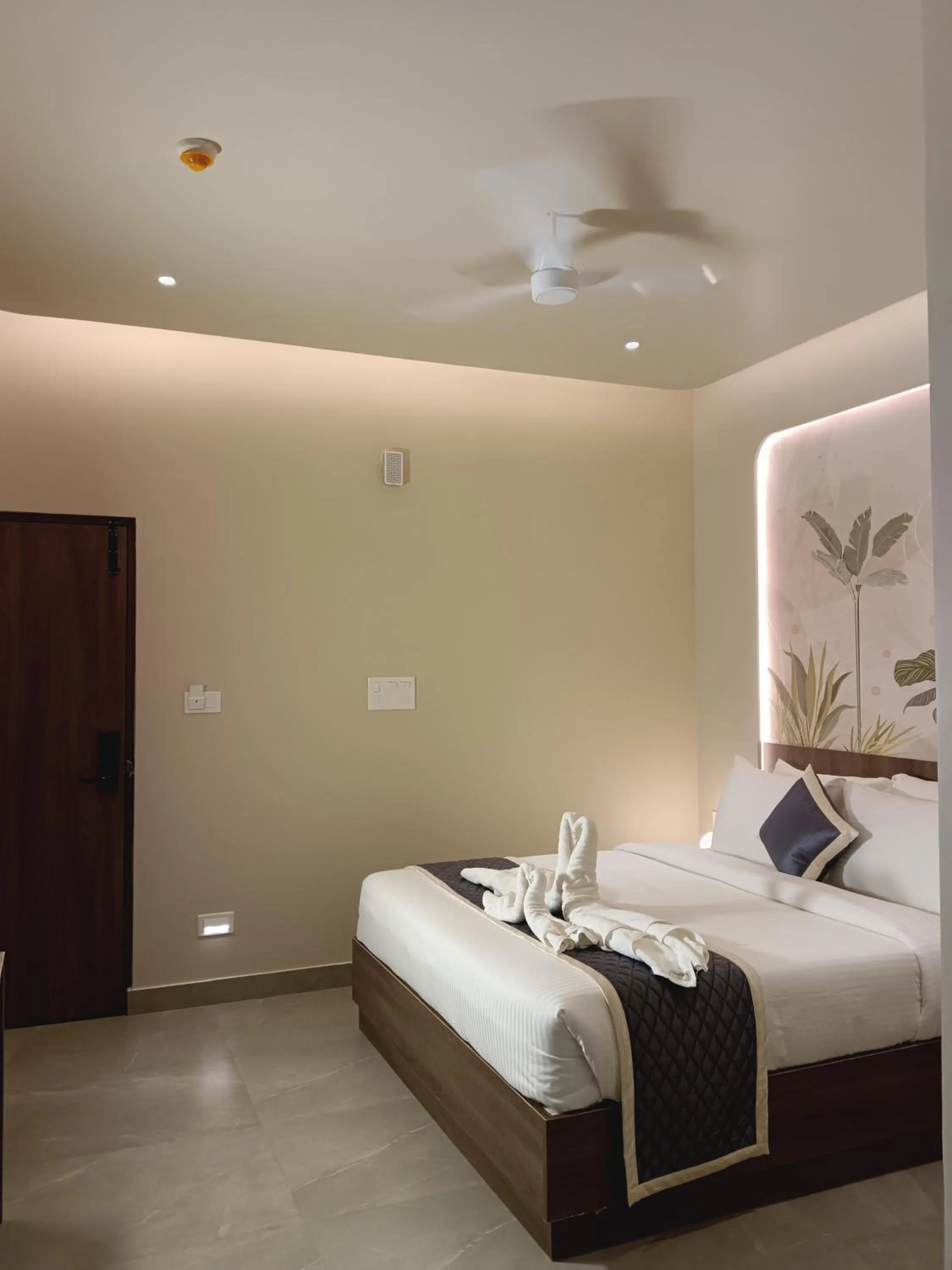 Bed in Hotel Muthahalli Grand