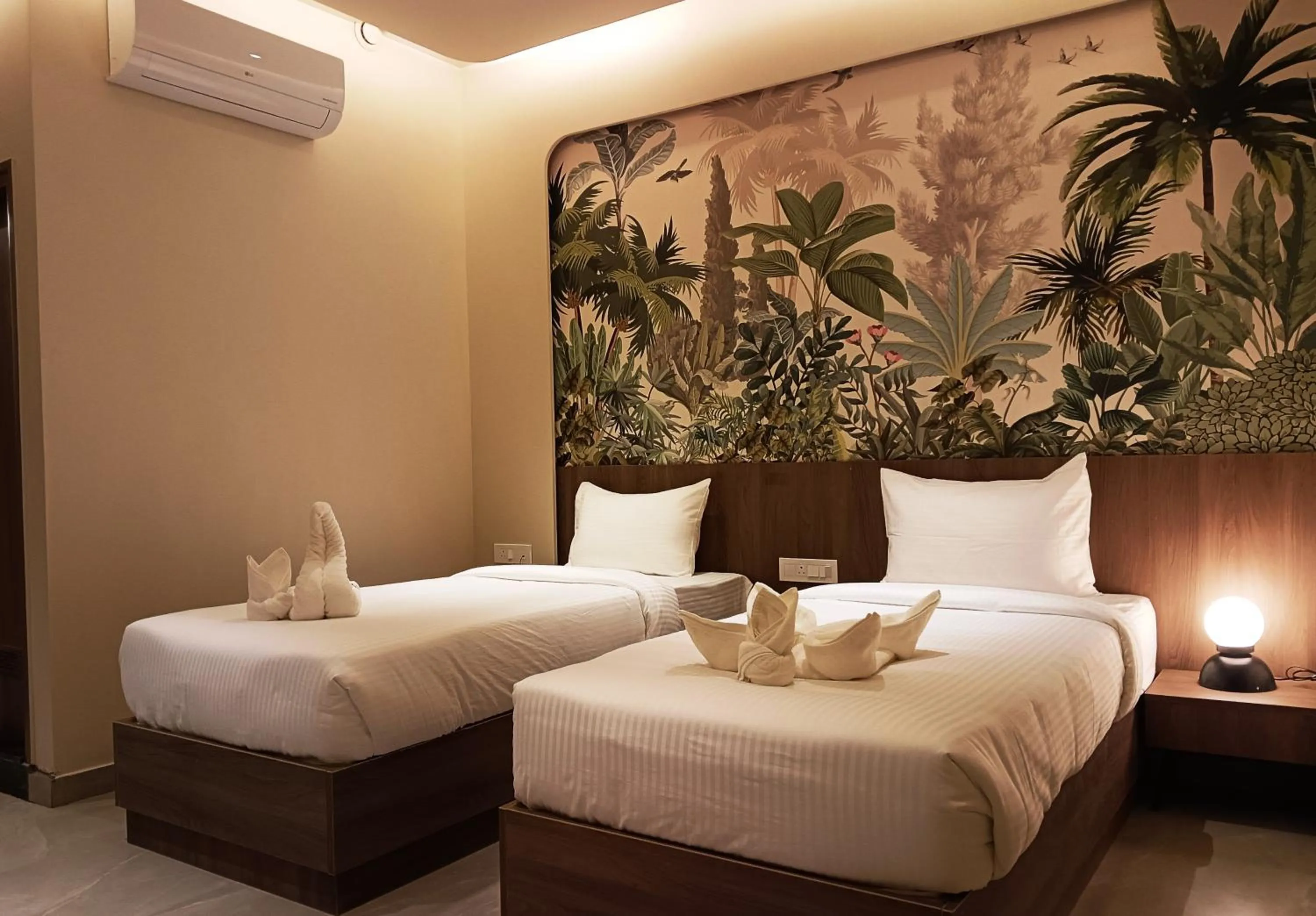 Bed in Hotel Muthahalli Grand