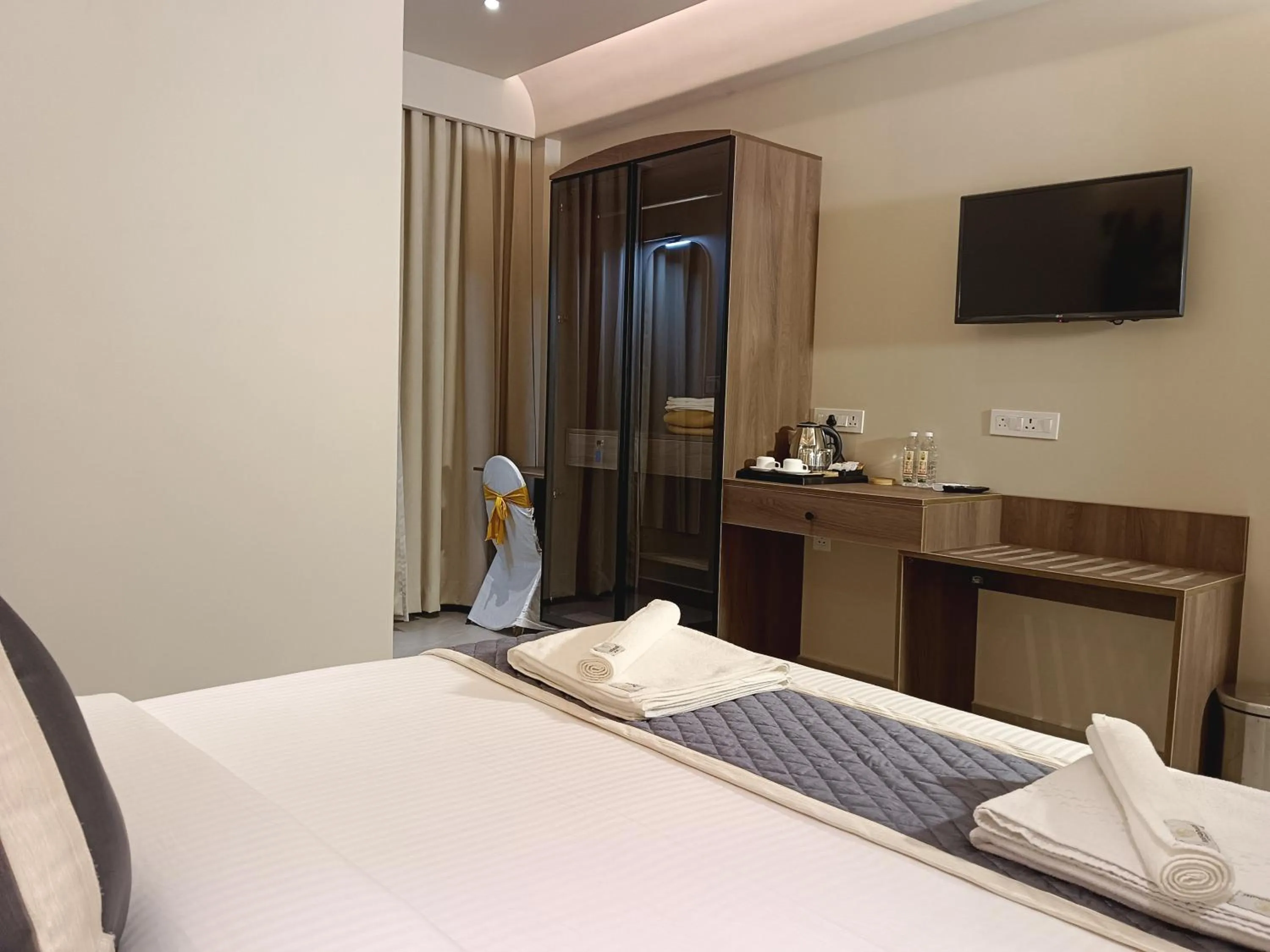 Bed in Hotel Muthahalli Grand