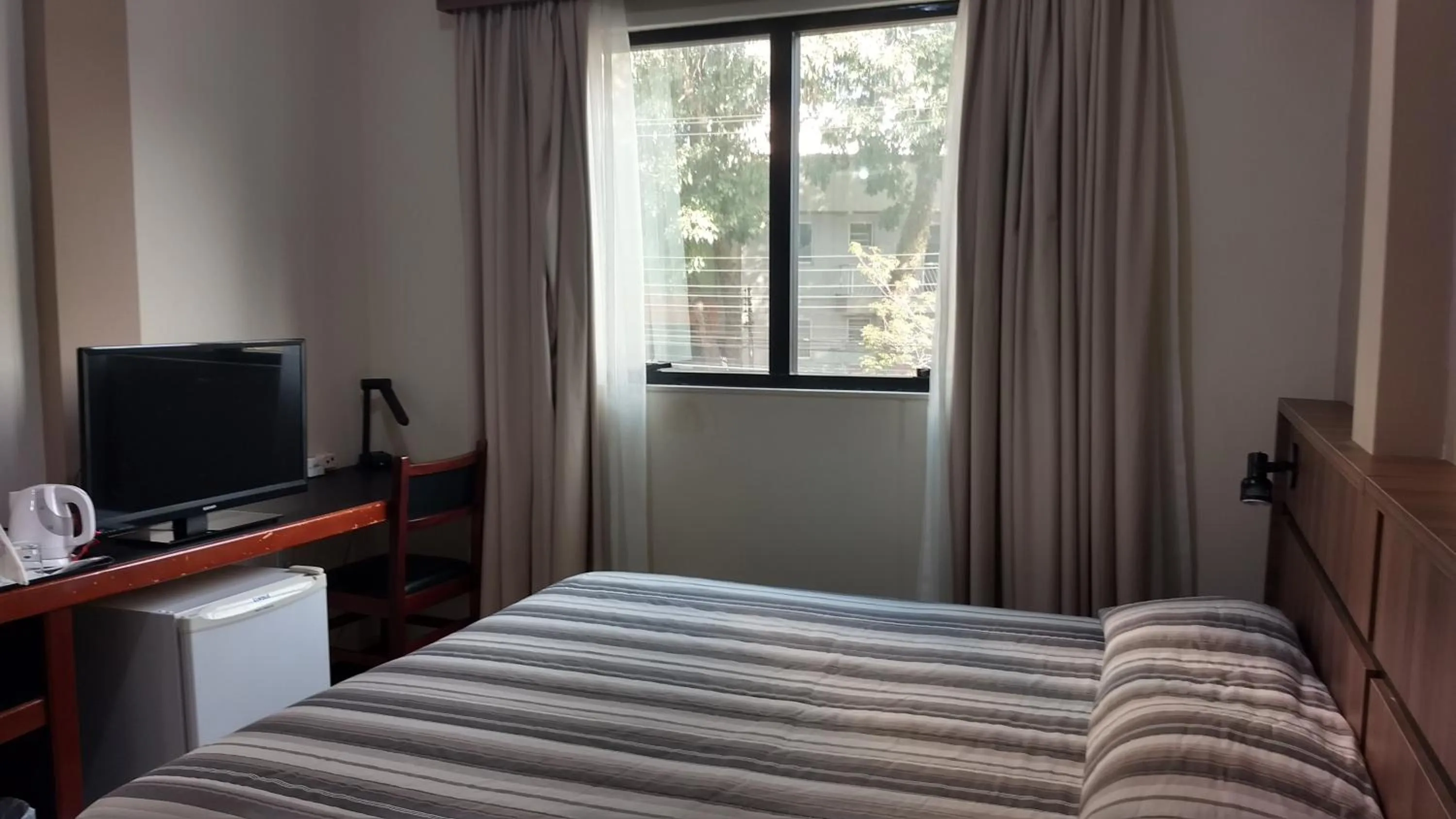 Bed in Castel Plaza Hotel