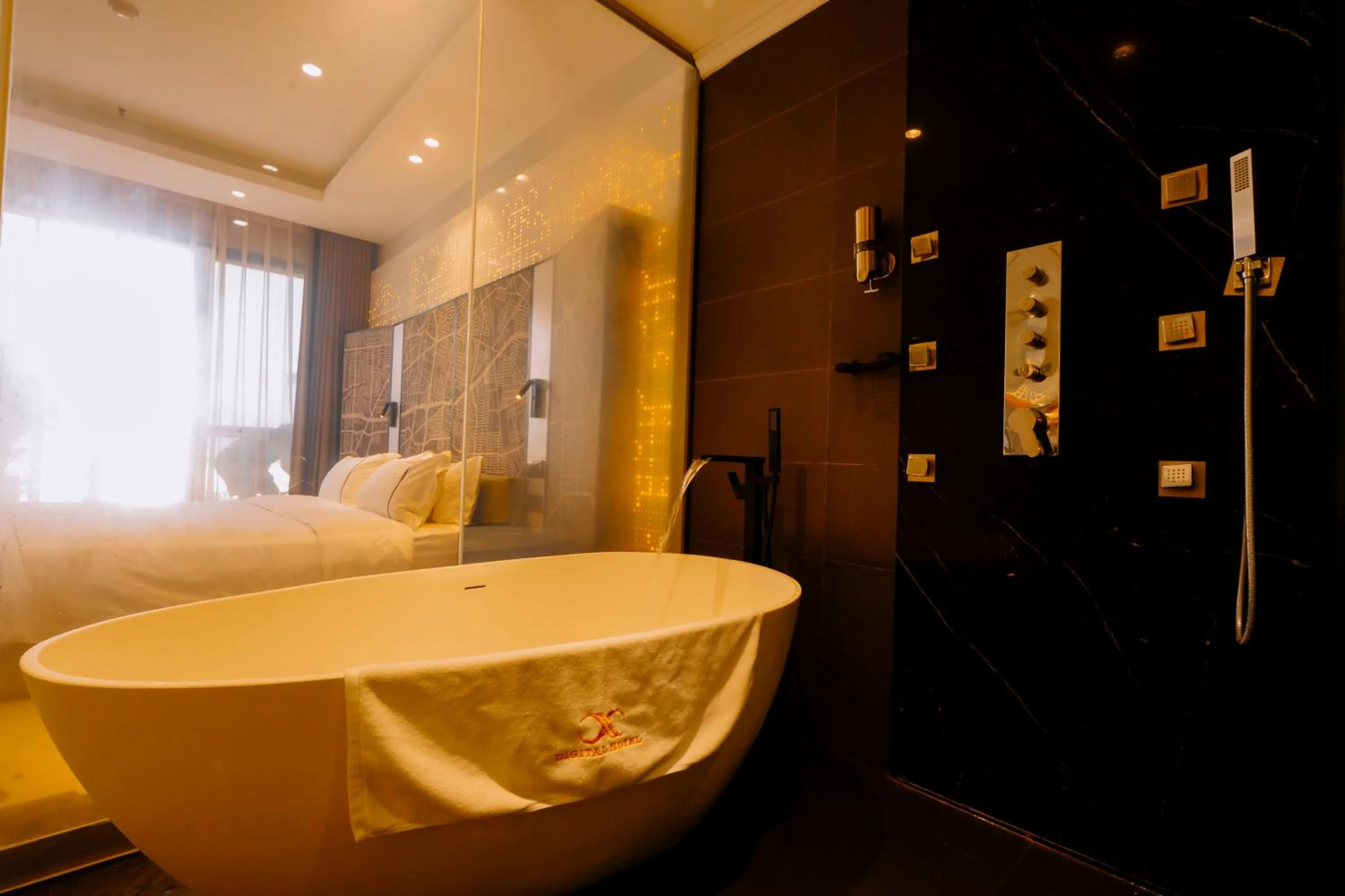 Shower in X-Digital HOTEL