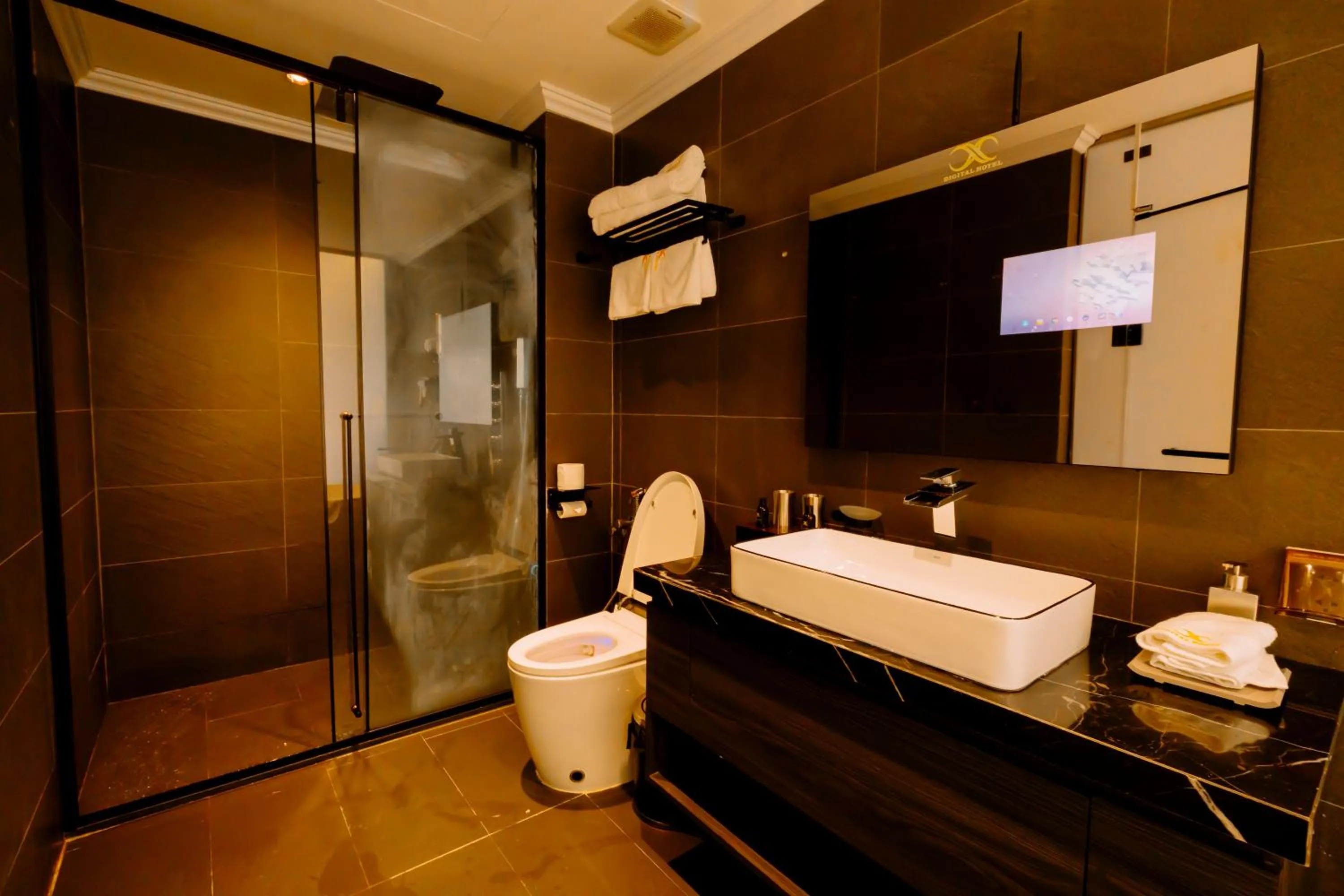 Shower in X-Digital HOTEL