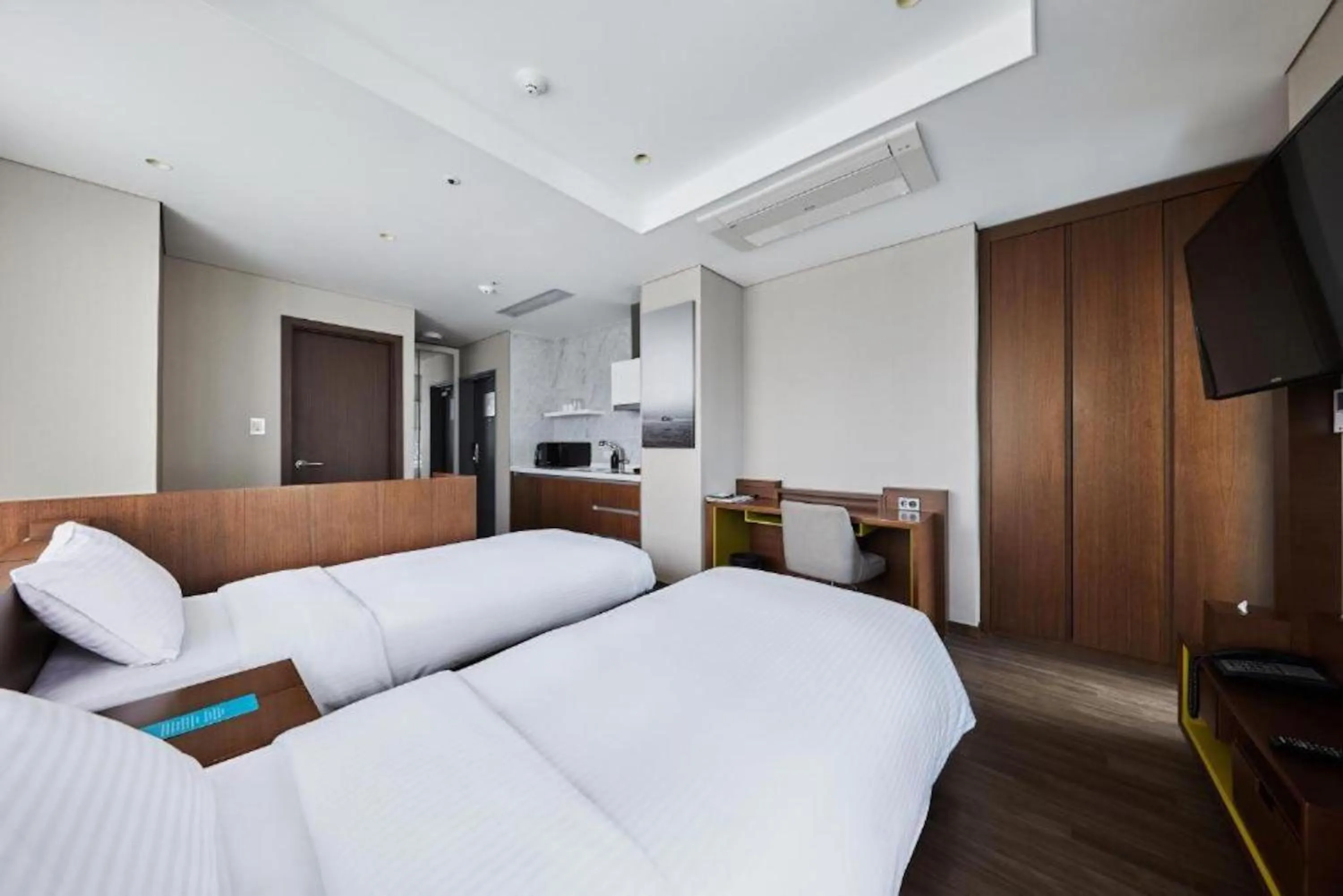 Bed in Felix by STX Hotel & Suite