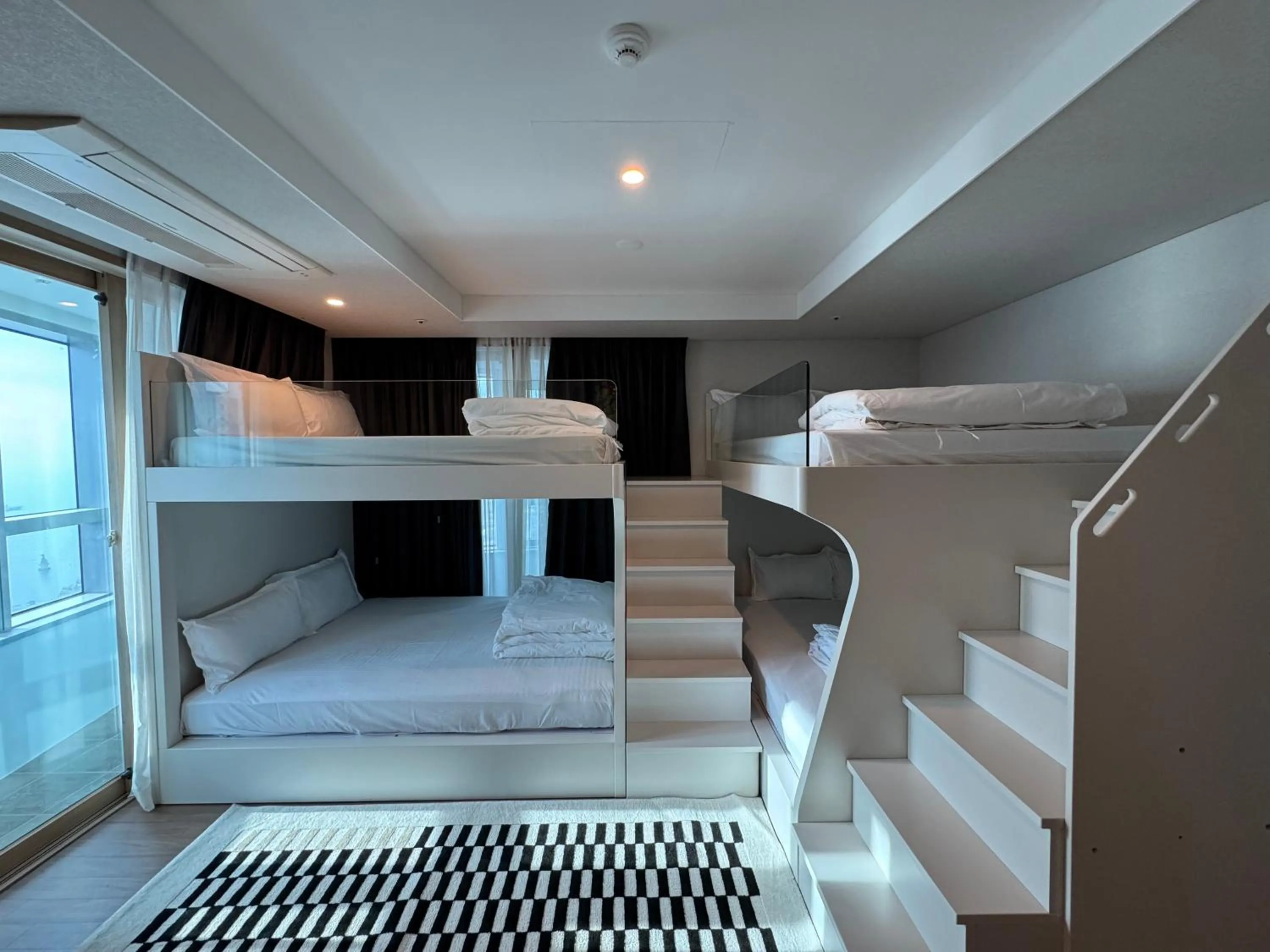 Bed in Felix by STX Hotel & Suite