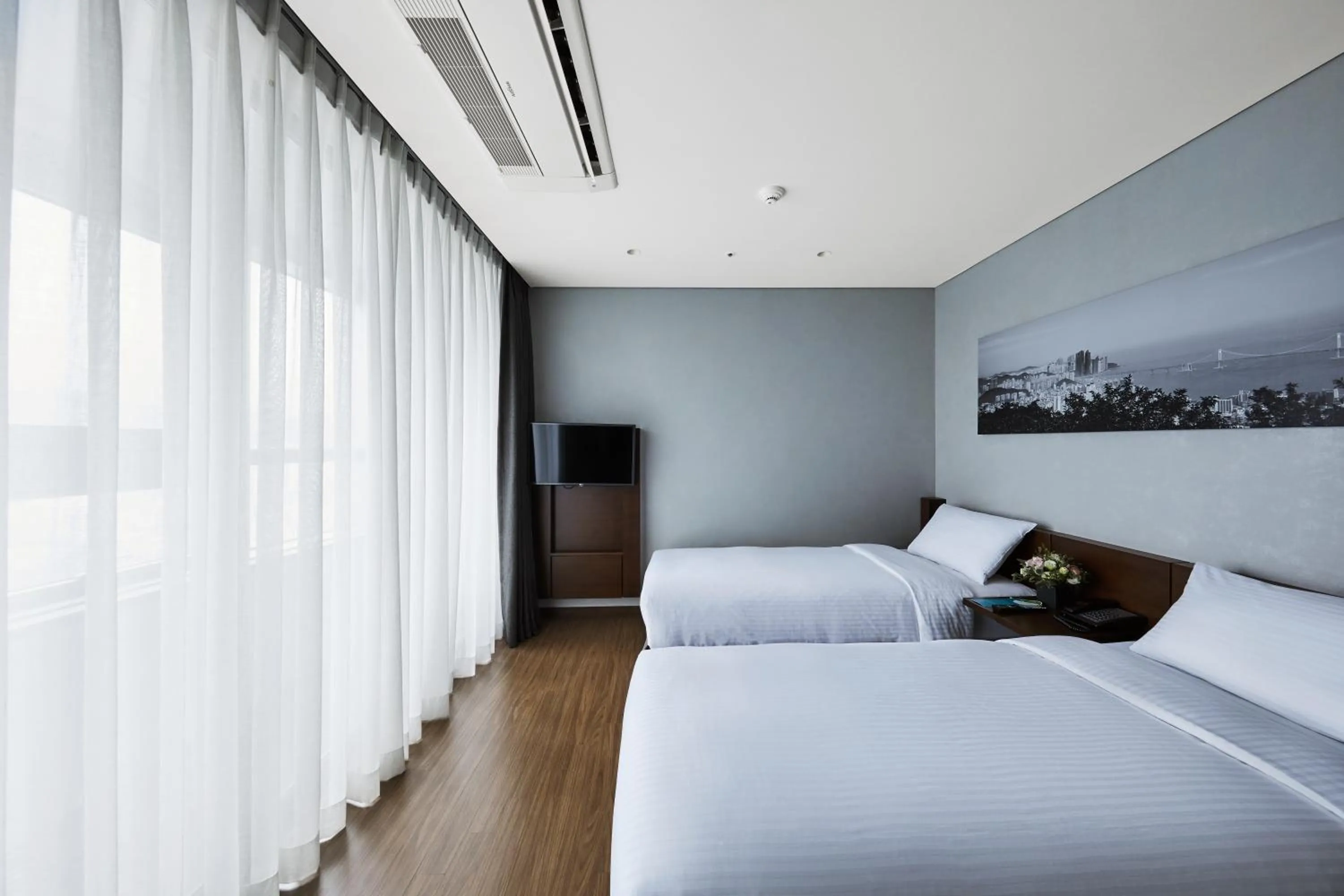 Bed in Felix by STX Hotel & Suite