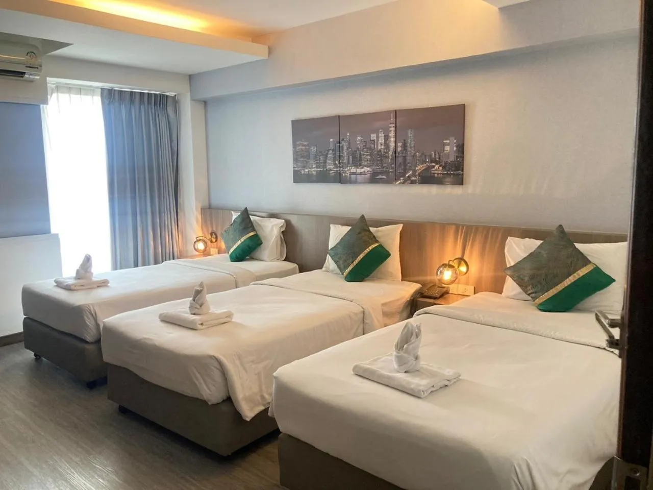 Bed in KANN Pattaya Hotel