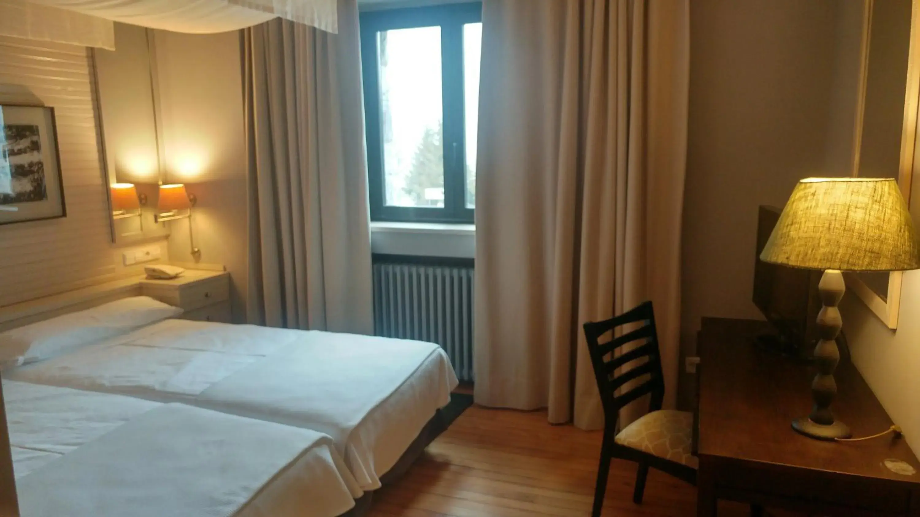 Photo of the whole room, Bed in Parador de Vielha Photo of the whole room, Bed in Parador de Vielha