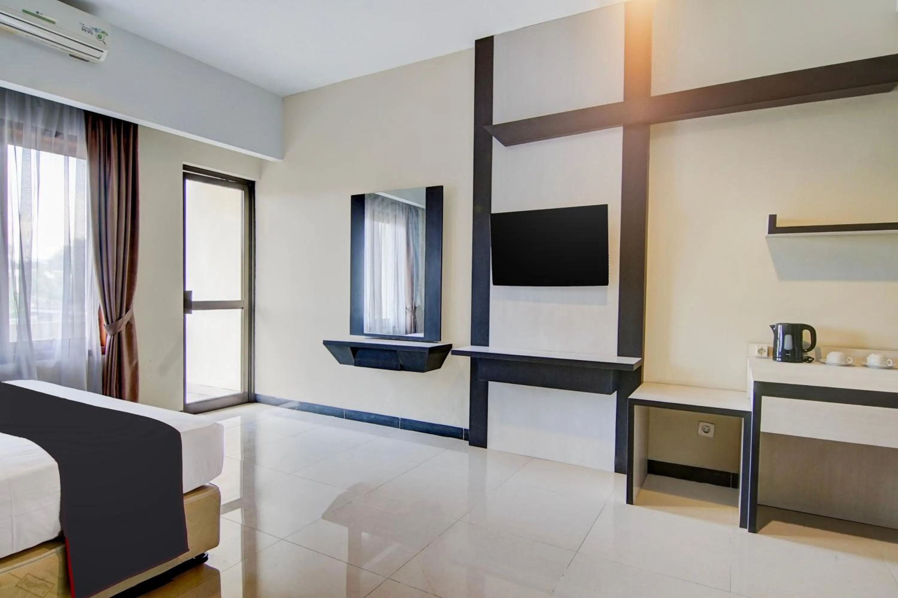 Bedroom, Bed in Townhouse Oak Pekanbaru near Mall Pekanbaru formerly Hotel Grand Sahara