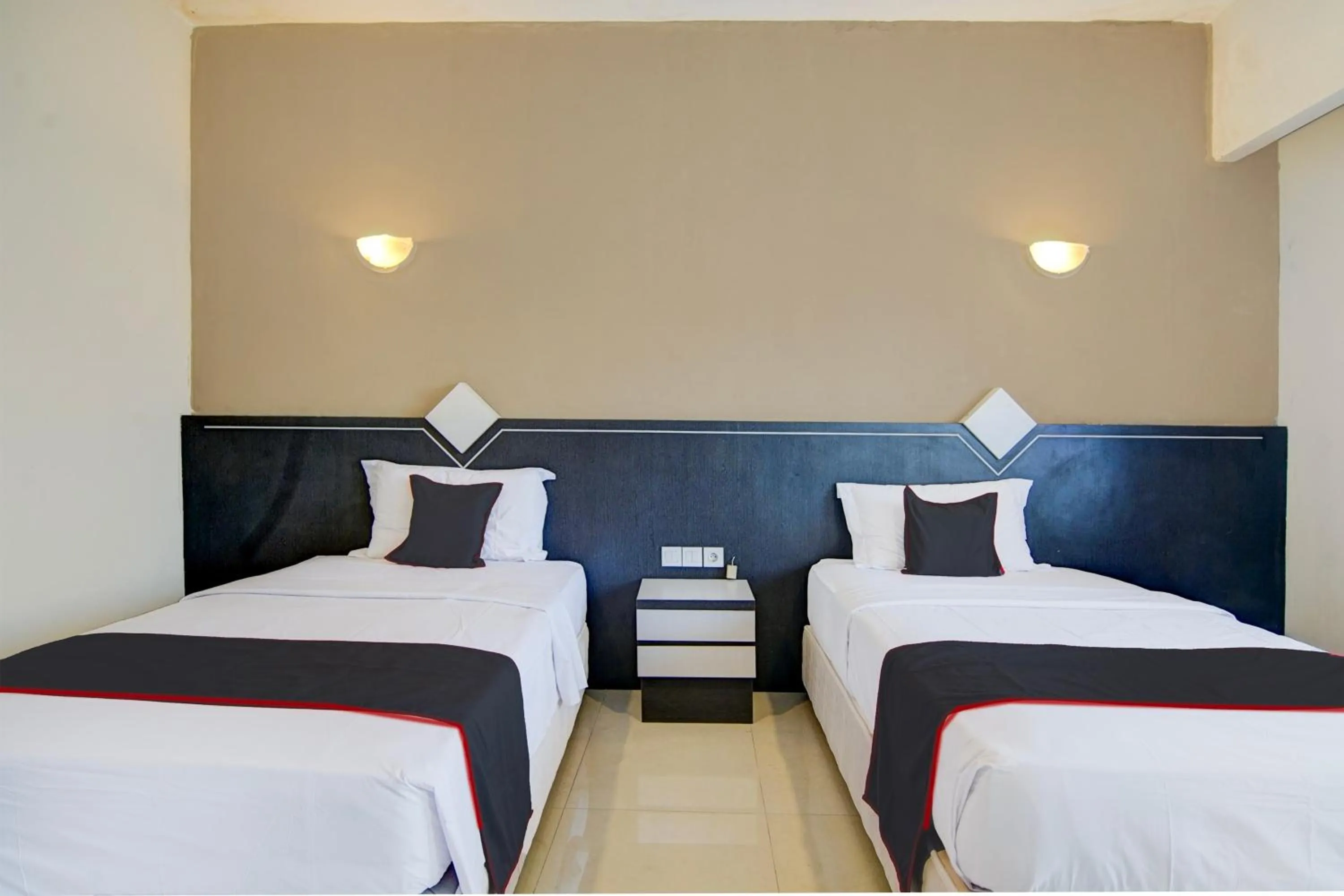 Bedroom, Bed in Townhouse Oak Pekanbaru near Mall Pekanbaru formerly Hotel Grand Sahara