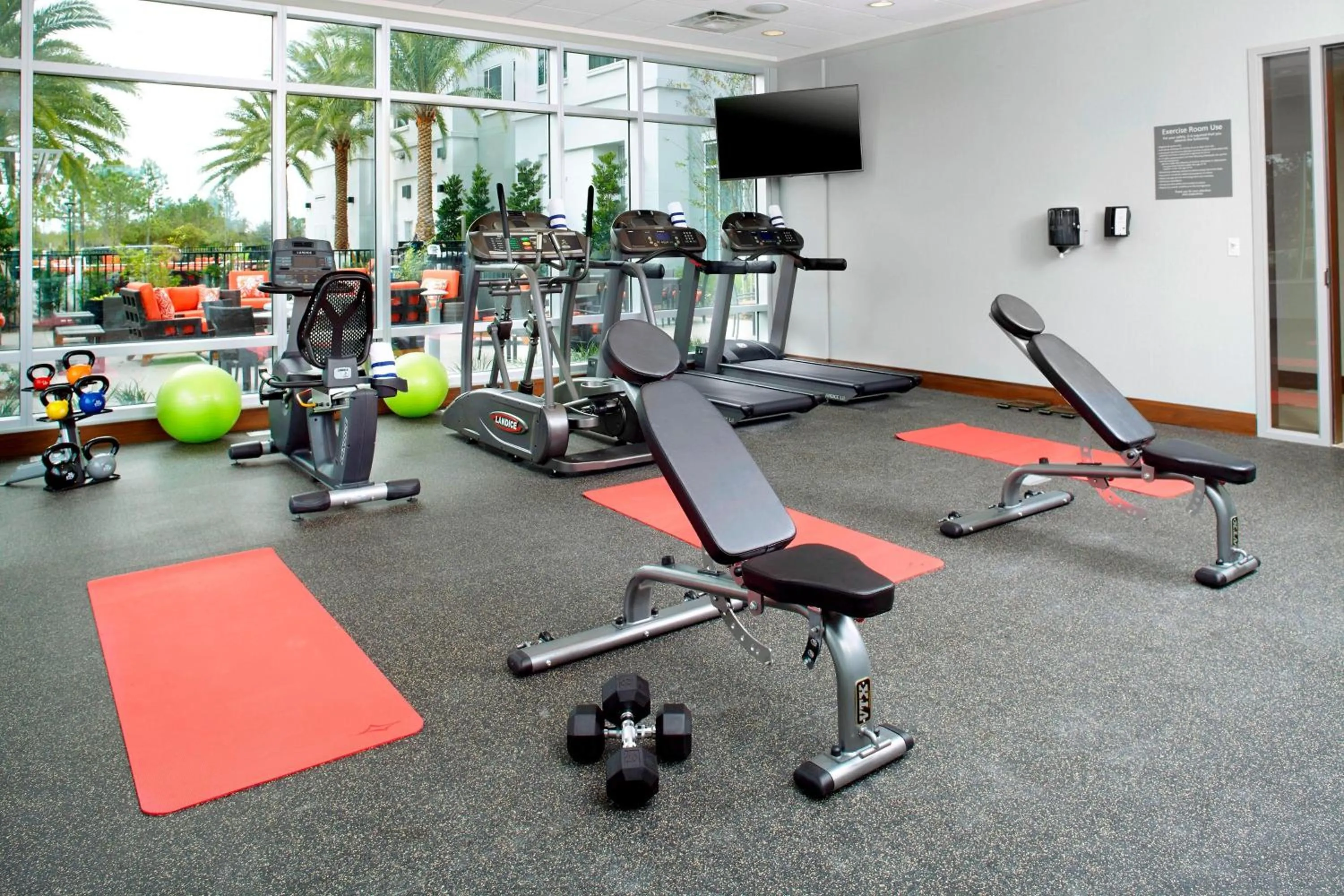 Fitness centre/facilities in Courtyard by Marriott Orlando Lake Nona