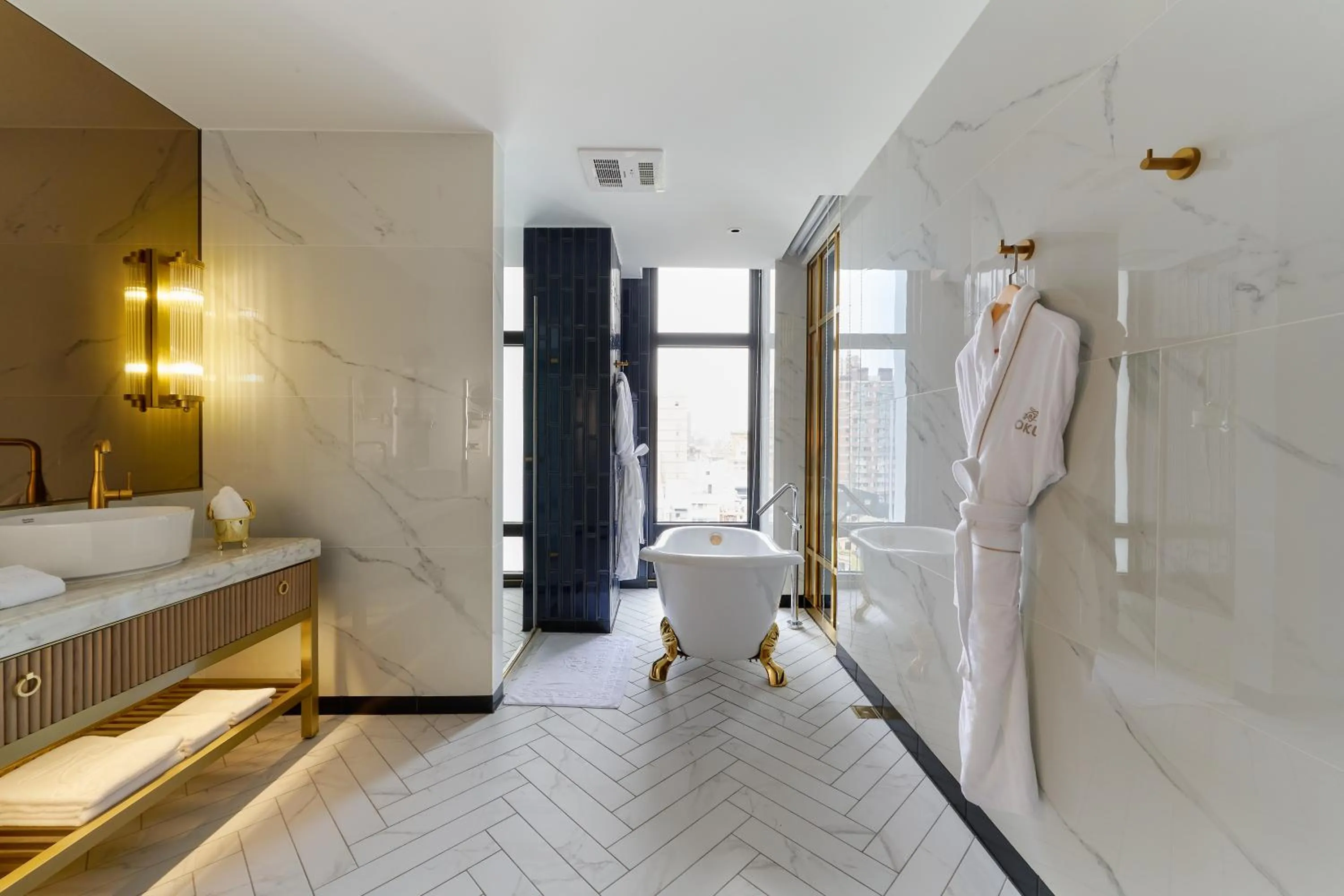 Bathroom, Bed in OKU Hotel