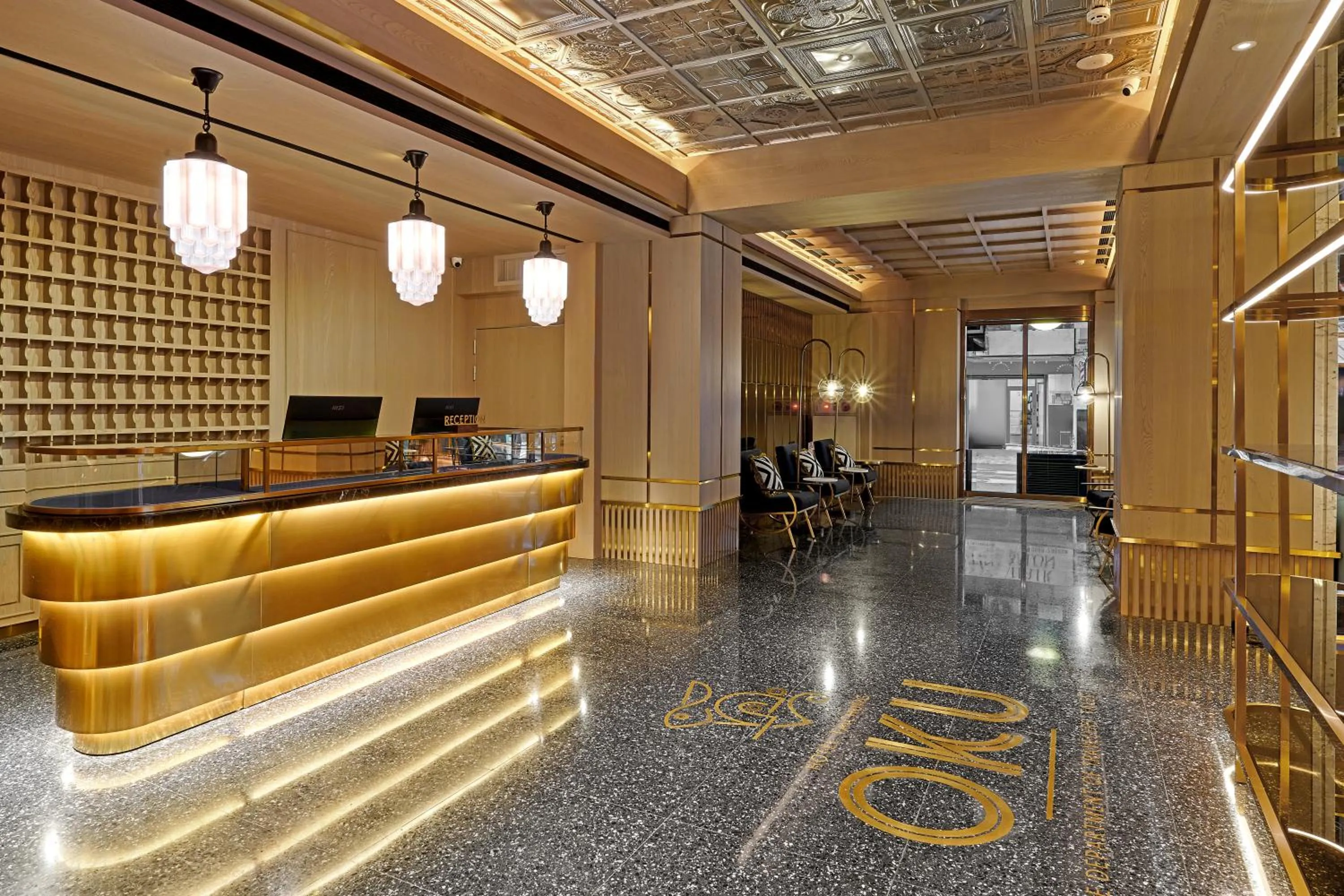 Lobby or reception in OKU Hotel