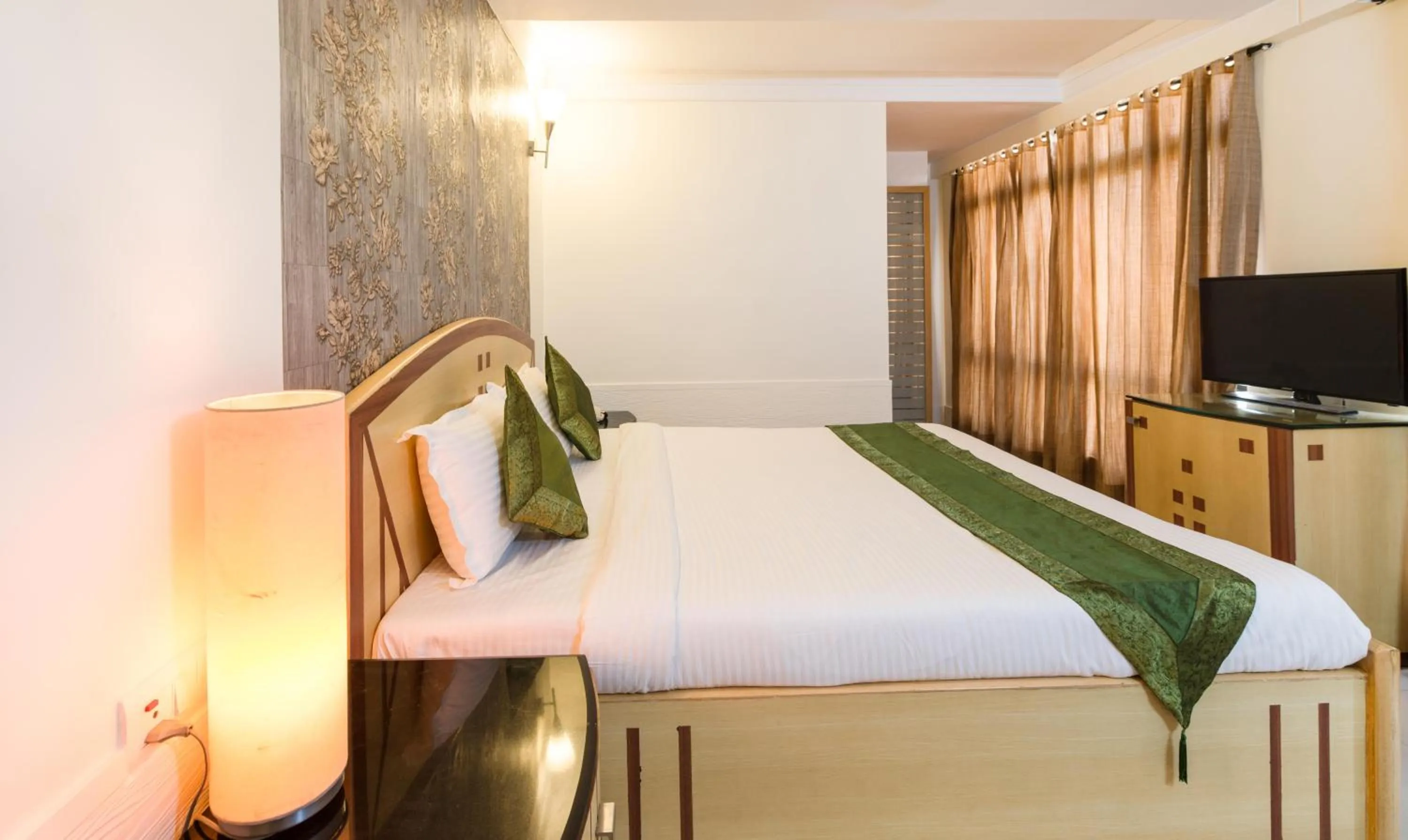 Bed in Treebo Paradise