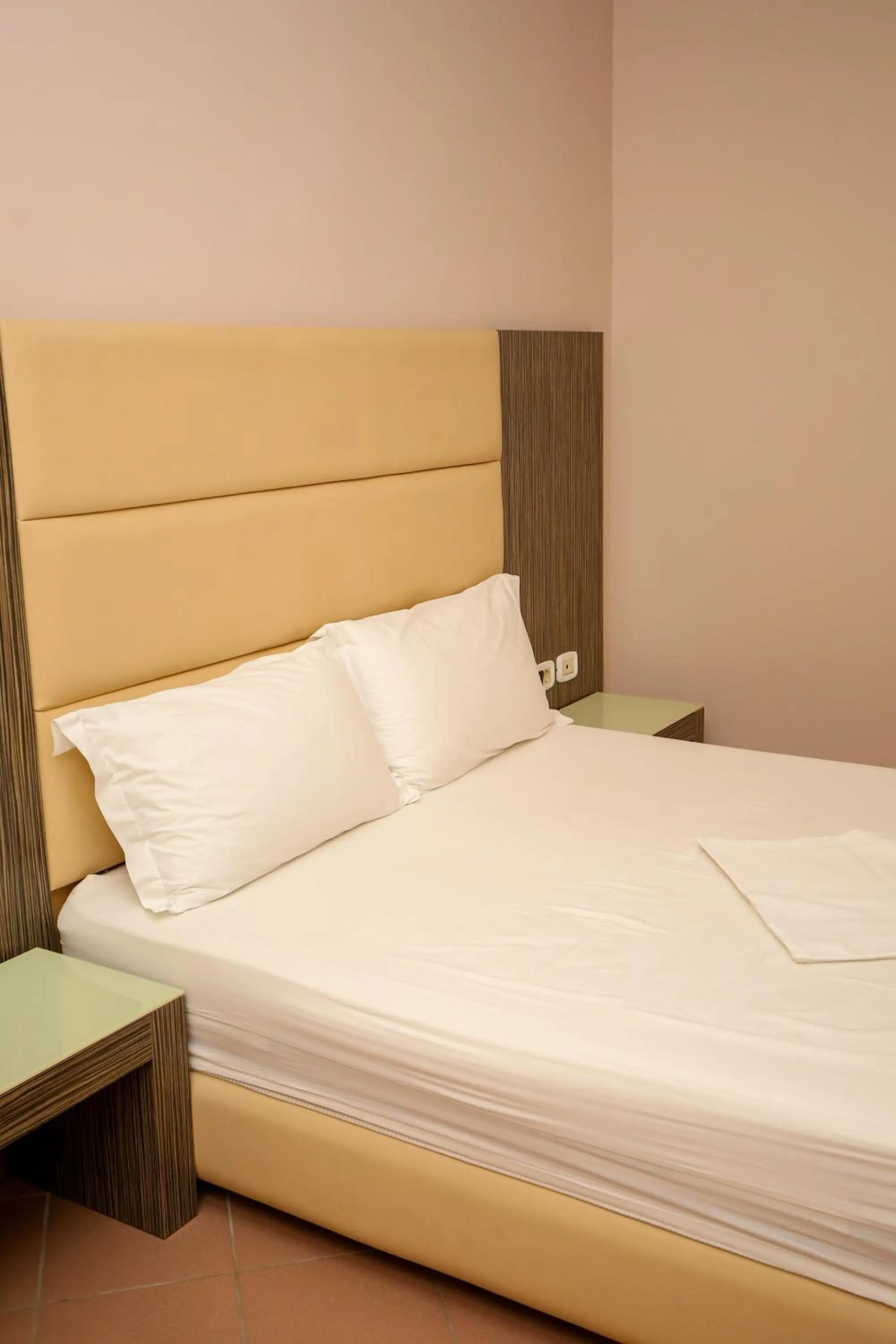 Bed in Aliko Hotel
