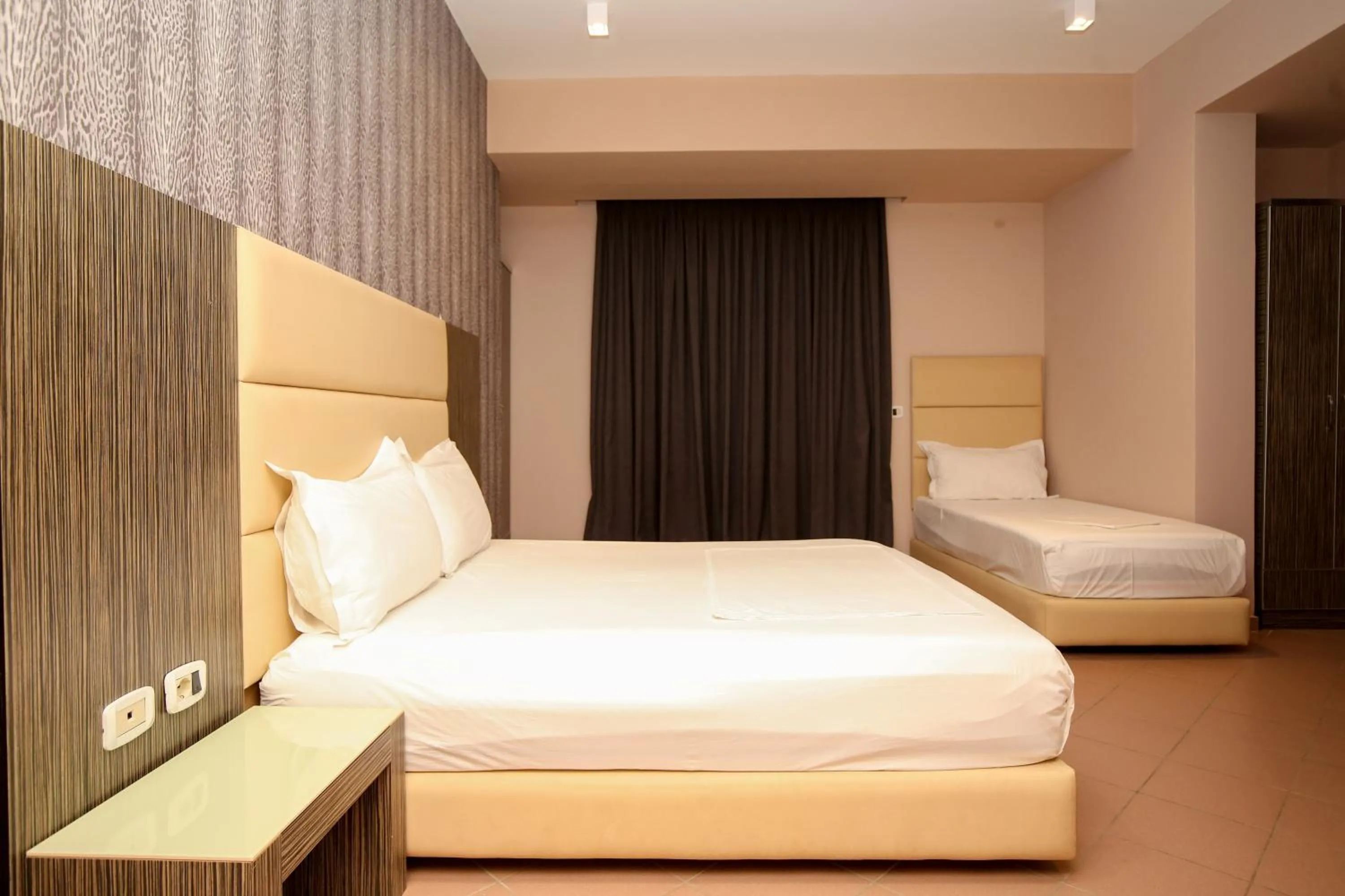 Bedroom in Aliko Hotel