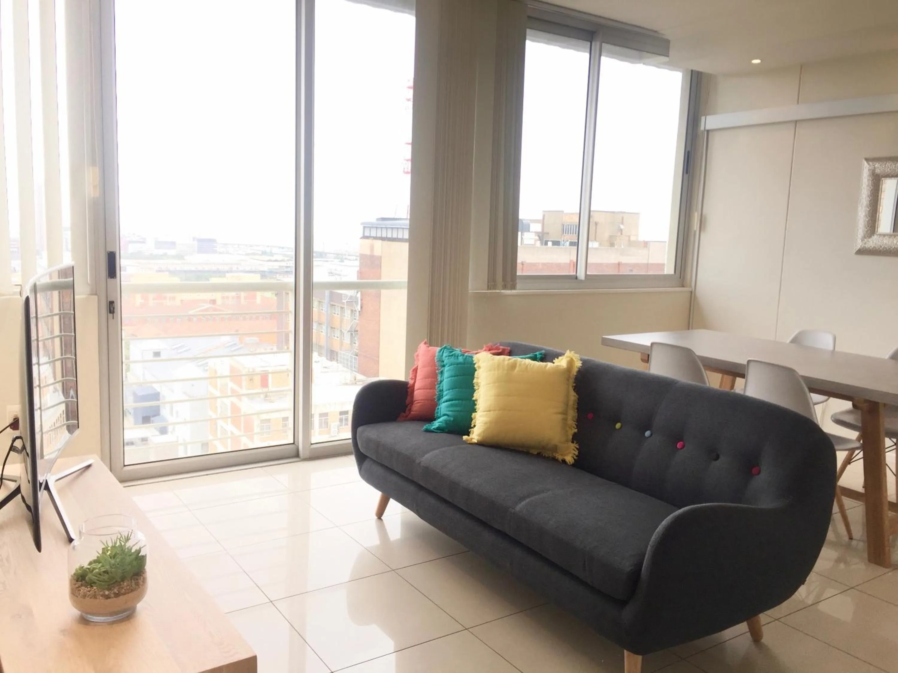 Living room in Urban Oasis at Perspectives