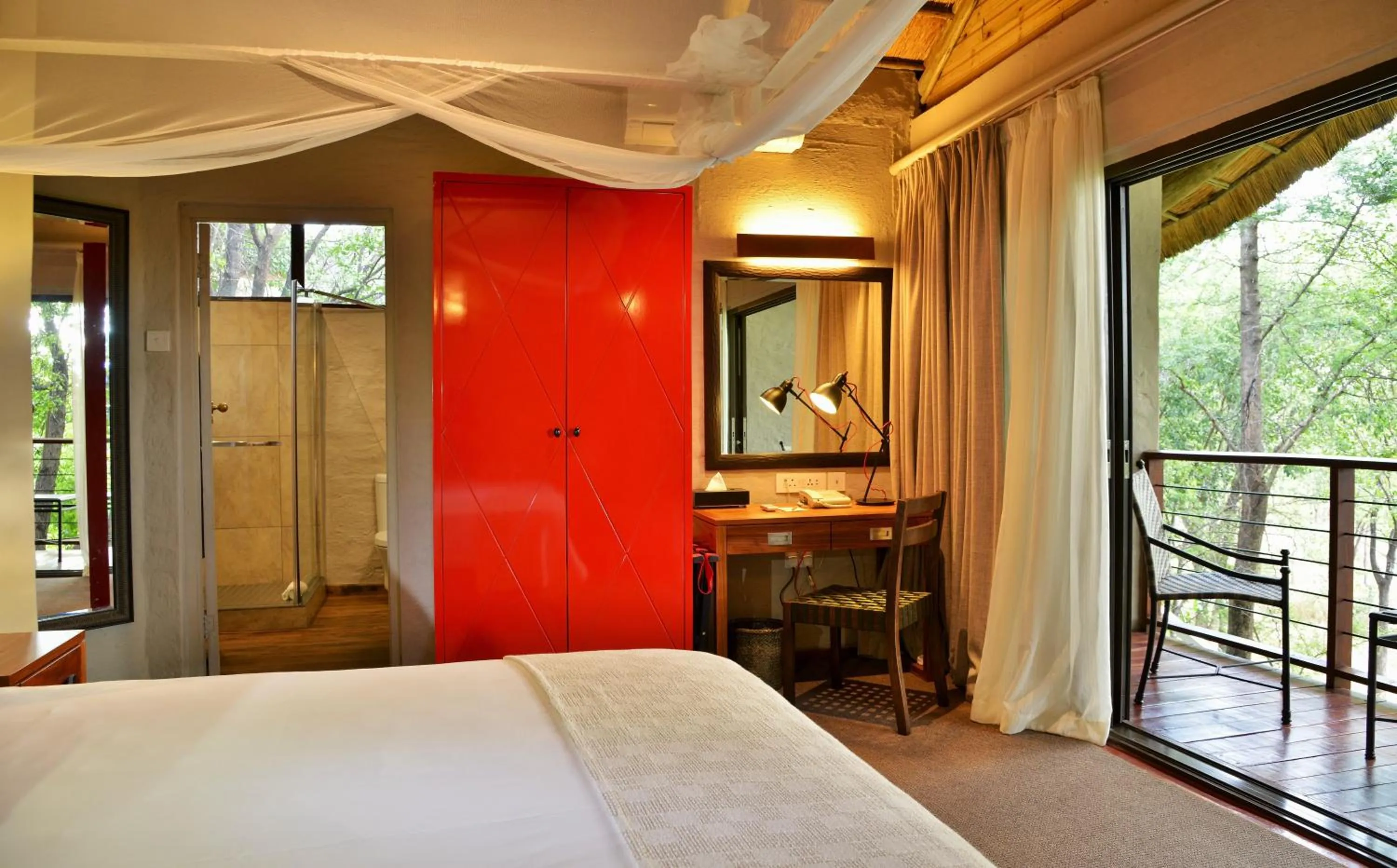 Balcony/Terrace, Bed in Victoria Falls Safari Suites