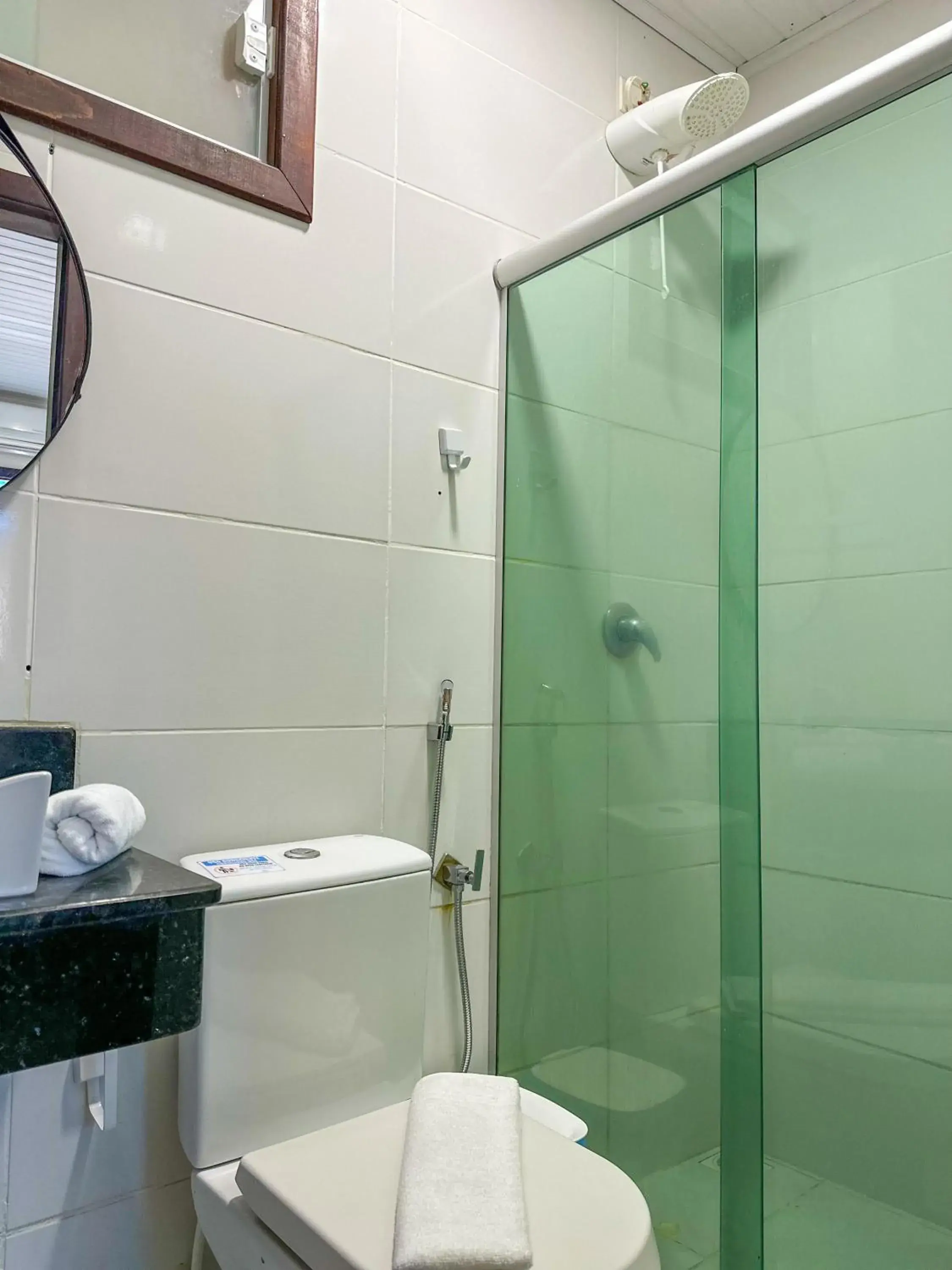 Standard Triple Room in Pousada Camburi Standard Triple Room in Pousada Camburi