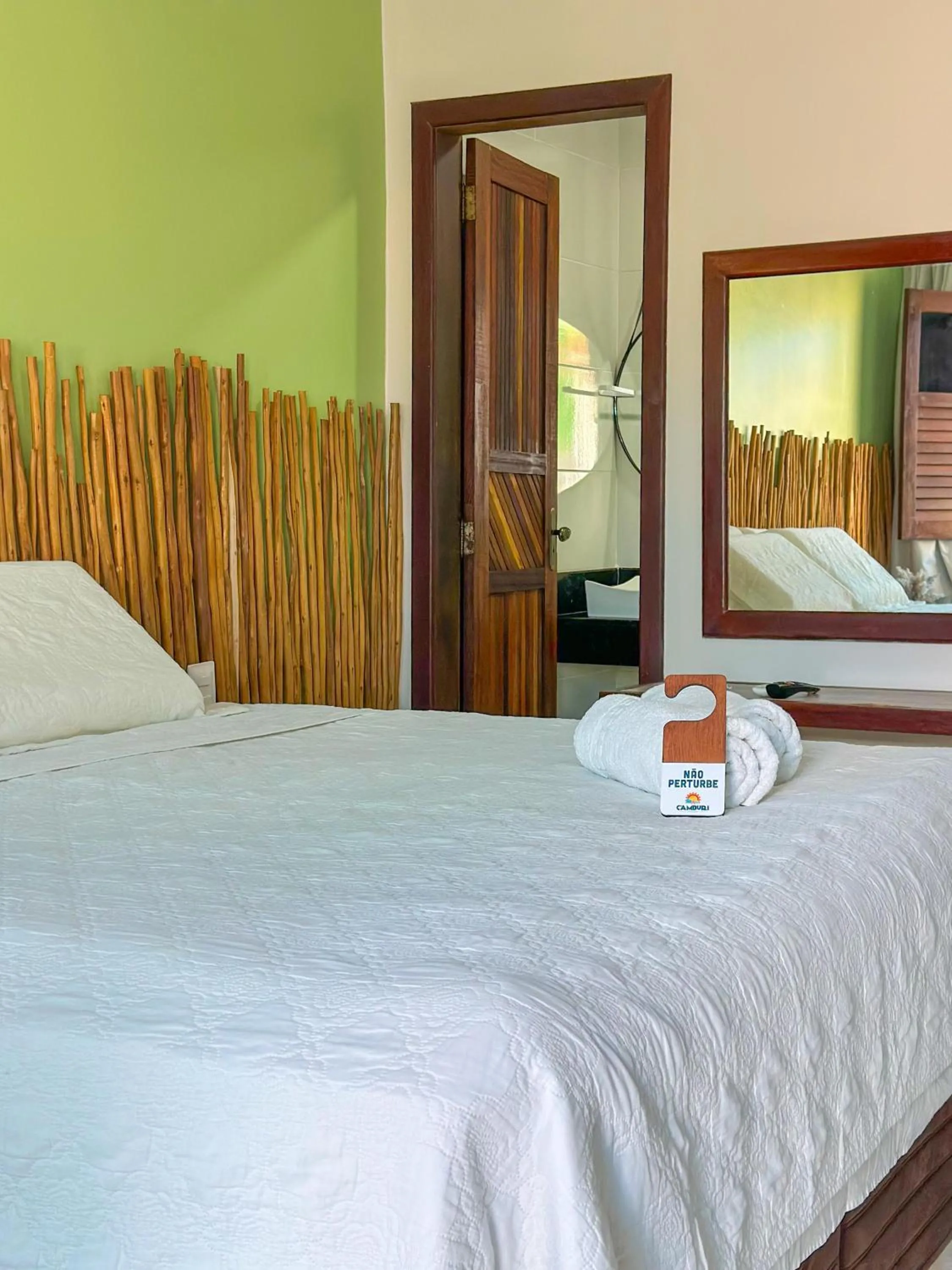Photo of the whole room, Bed in Pousada Camburi