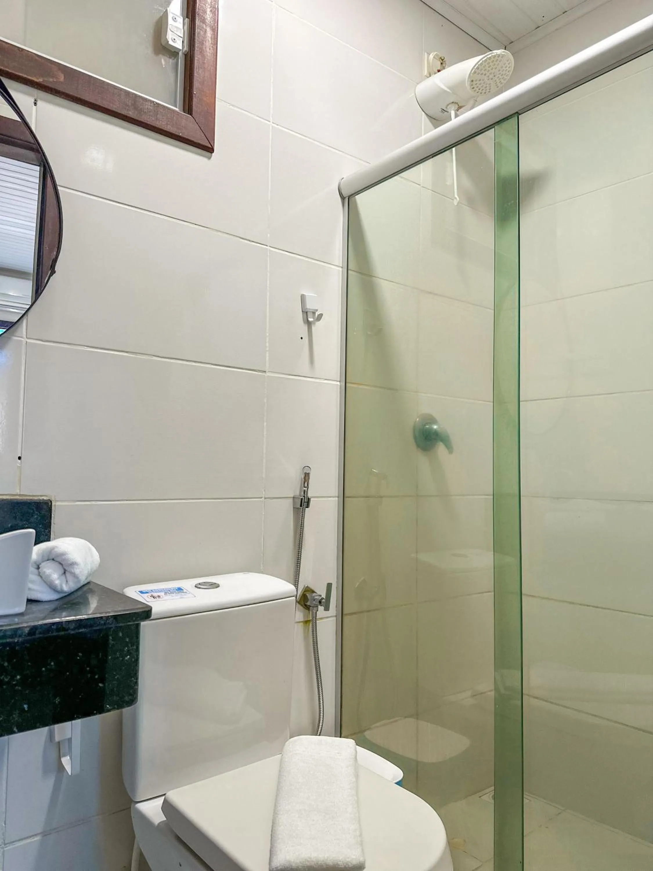 Toilet in Pousada Camburi