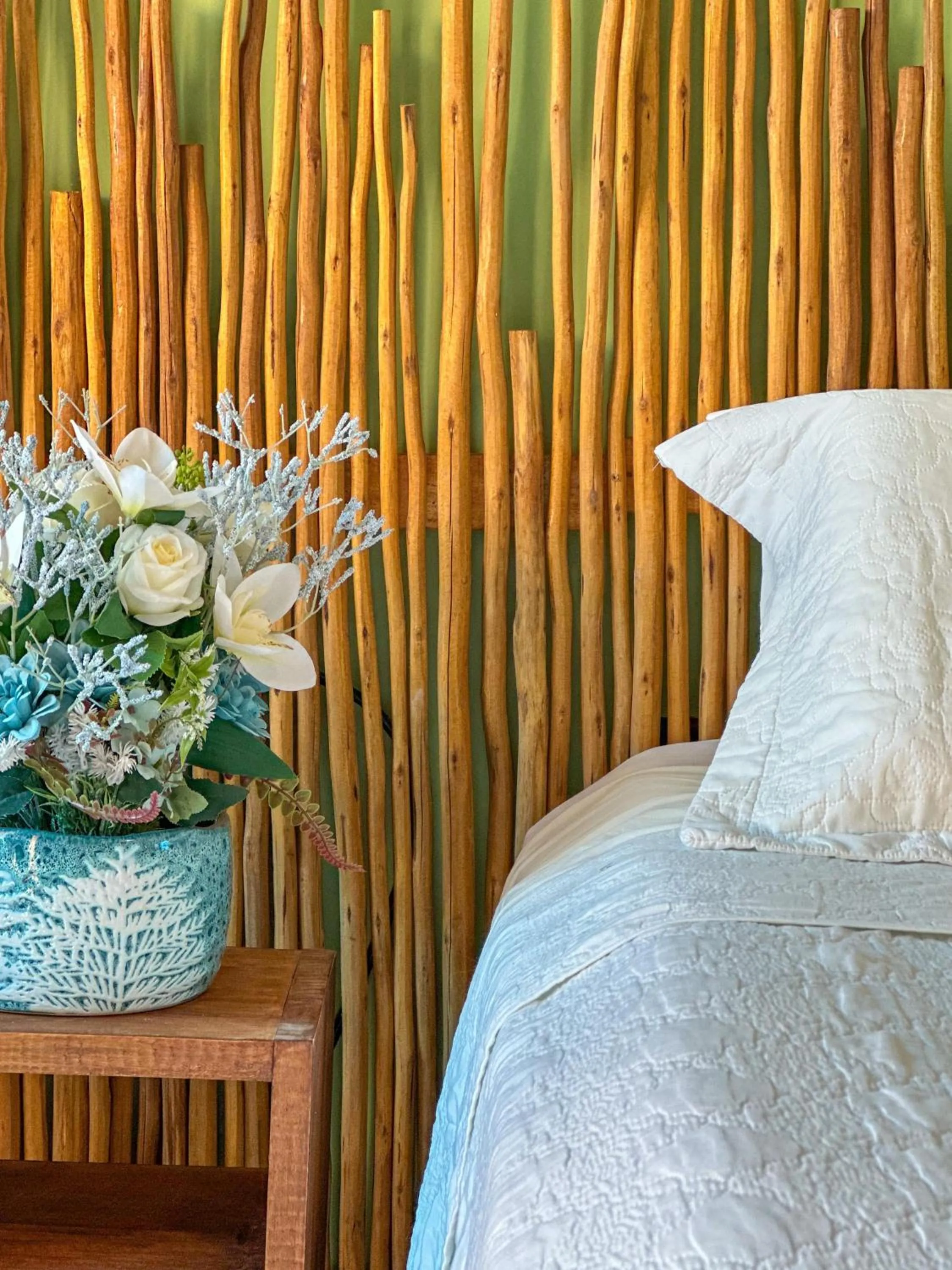 Bed in Pousada Camburi