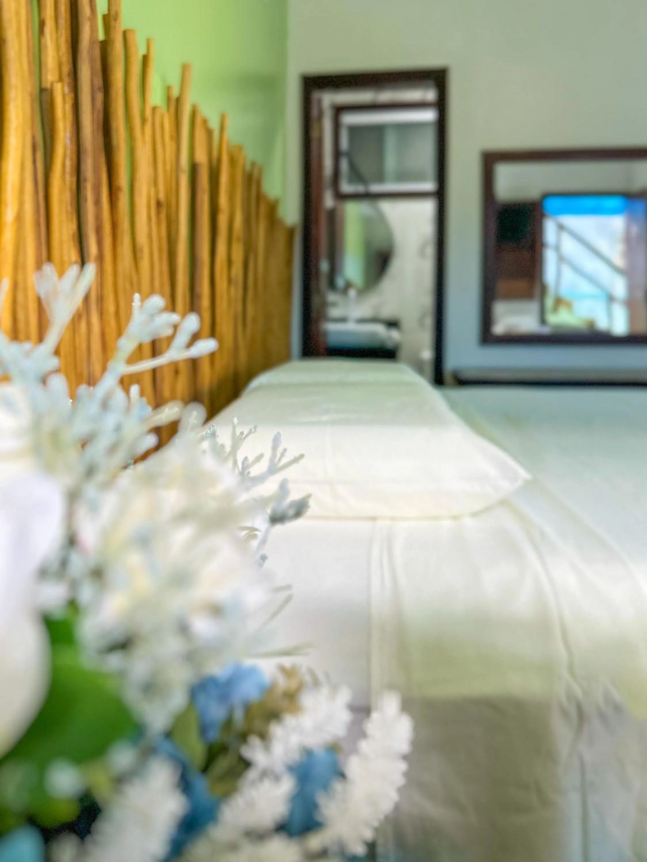 Bed in Pousada Camburi