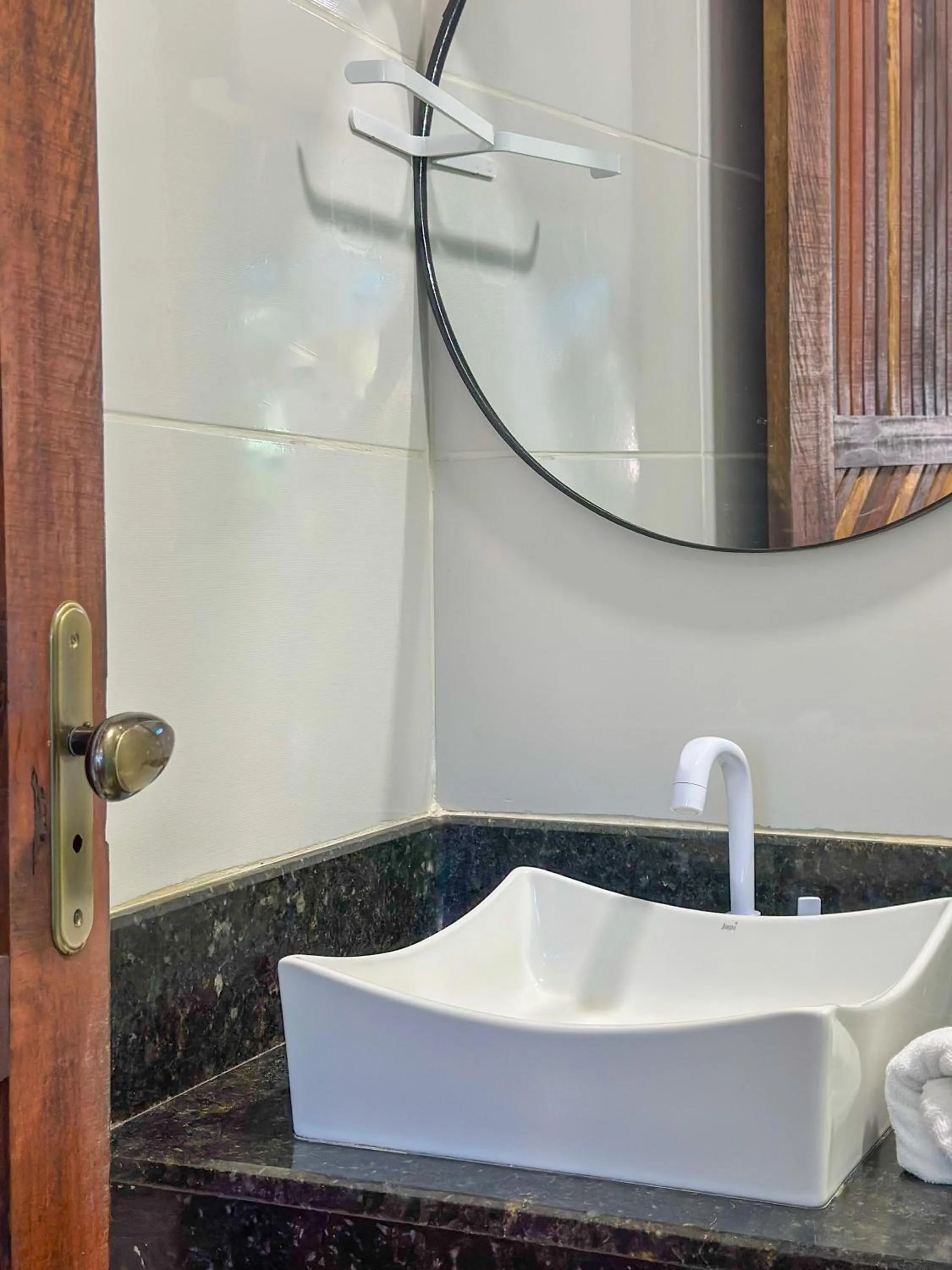 Bathroom in Pousada Camburi