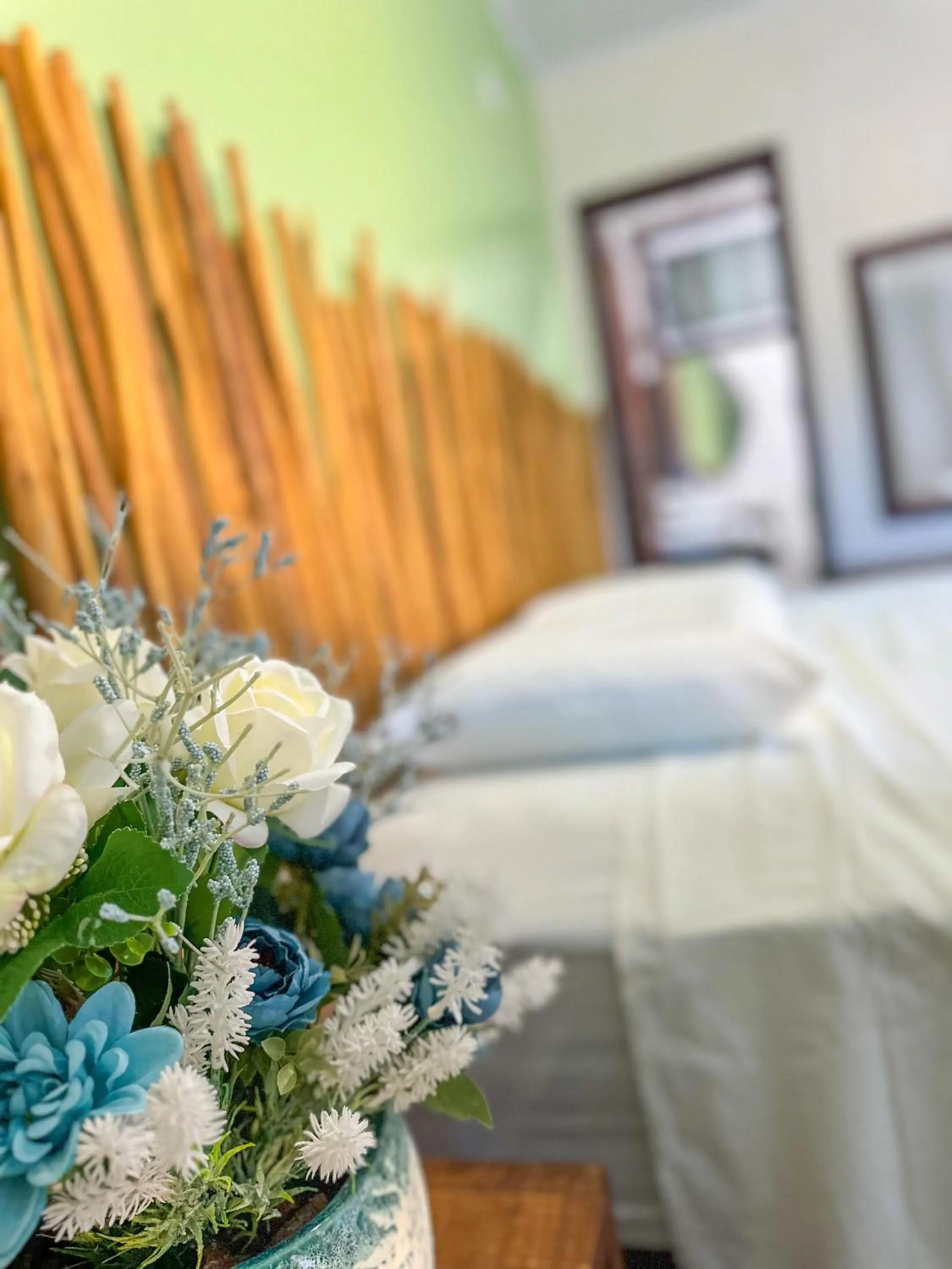 Bed in Pousada Camburi