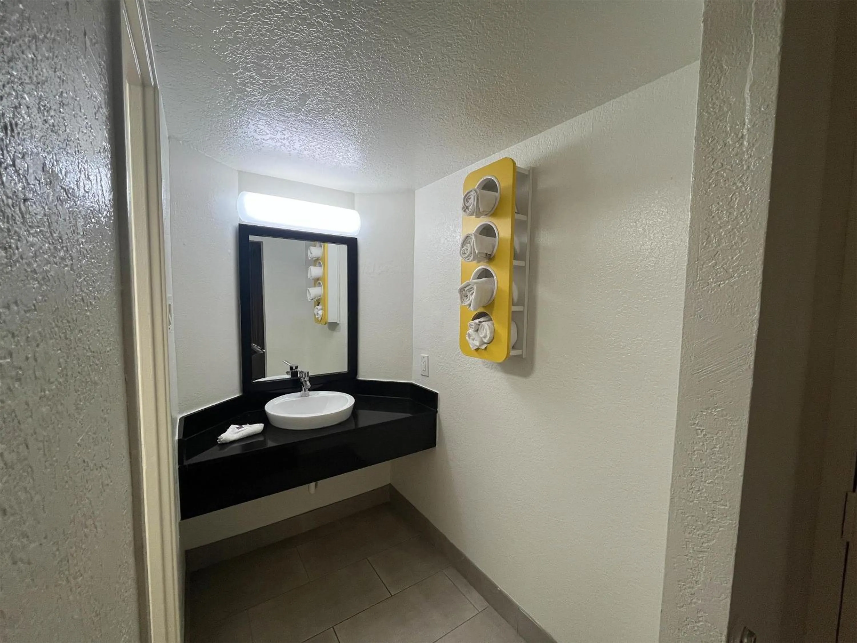 Bathroom in Studio 6 Suites Euless, TX – DFW West