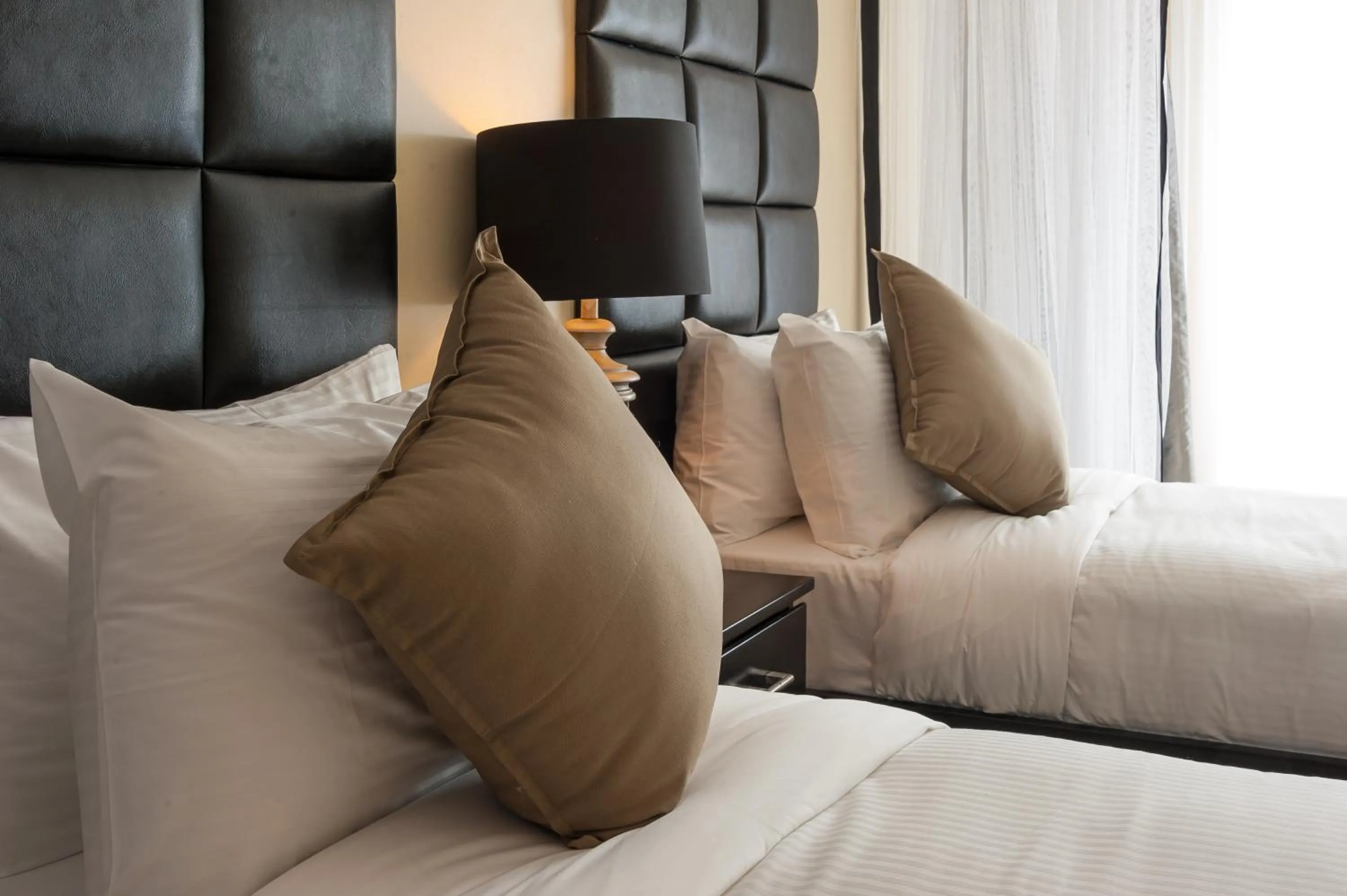 Bed in Acacia Premier Hotel