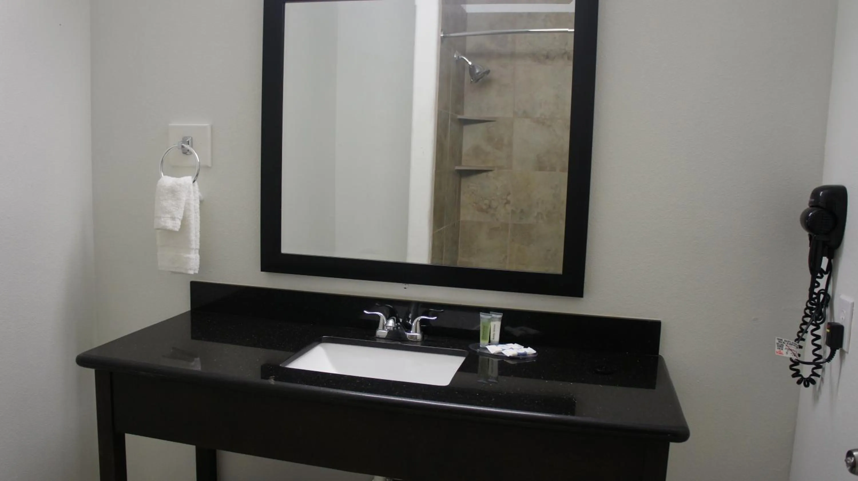 Bathroom in Lux Inn and Suites