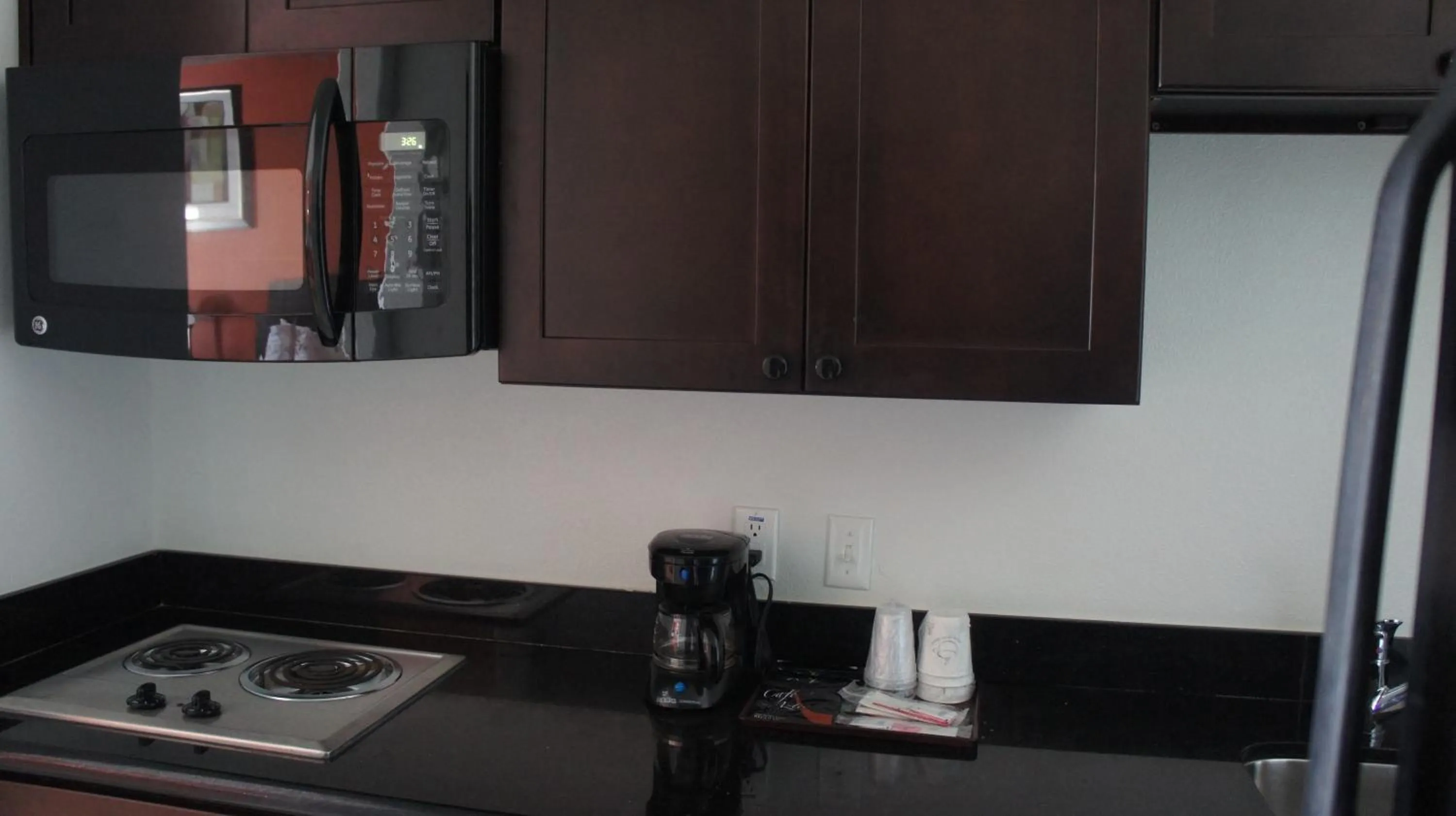Kitchen or kitchenette in Lux Inn and Suites