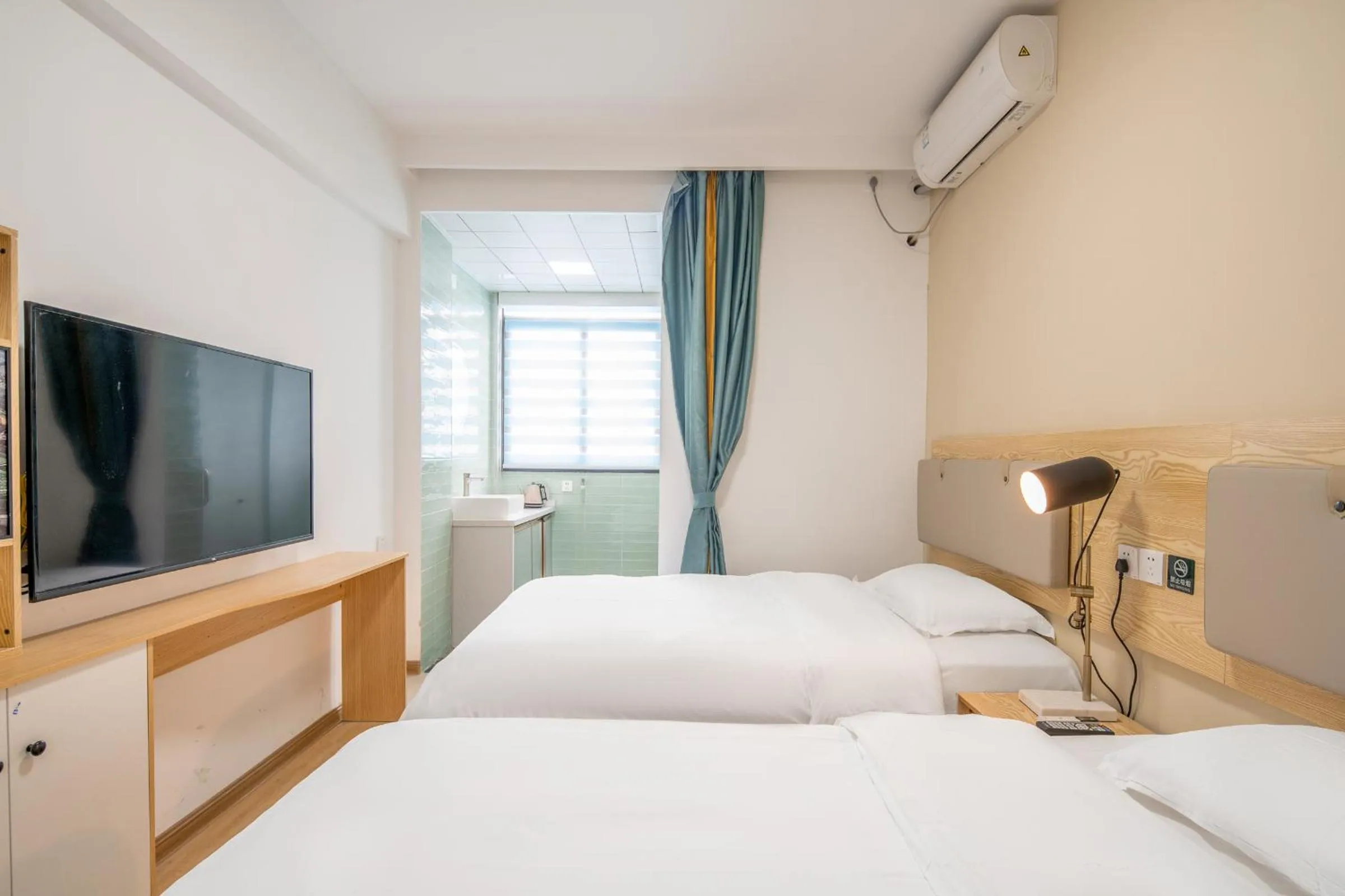 Bed in Sucha Hotel Xiamen Gaoqi International Airport