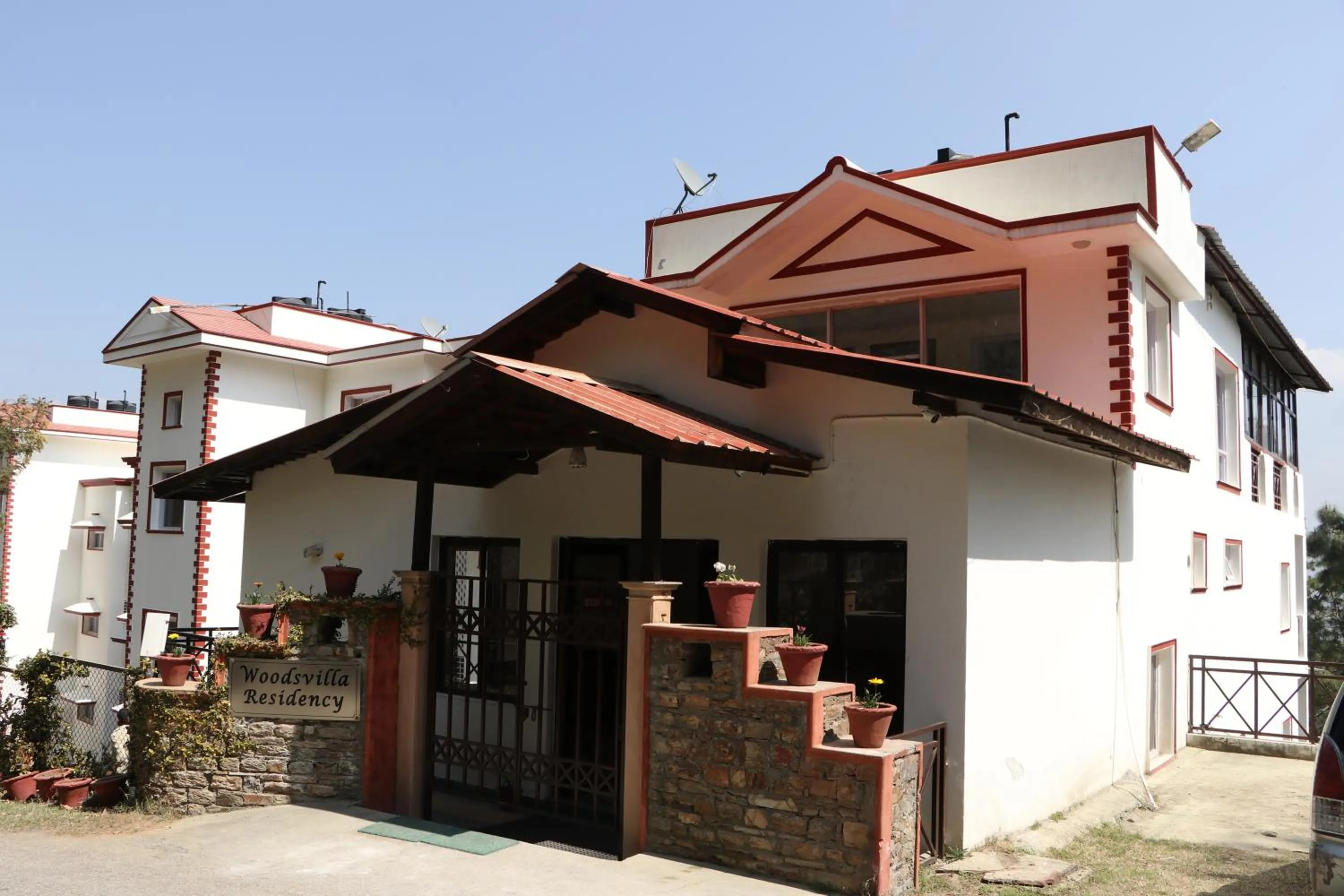 Property building in Woodsvilla Residency Ranikhet