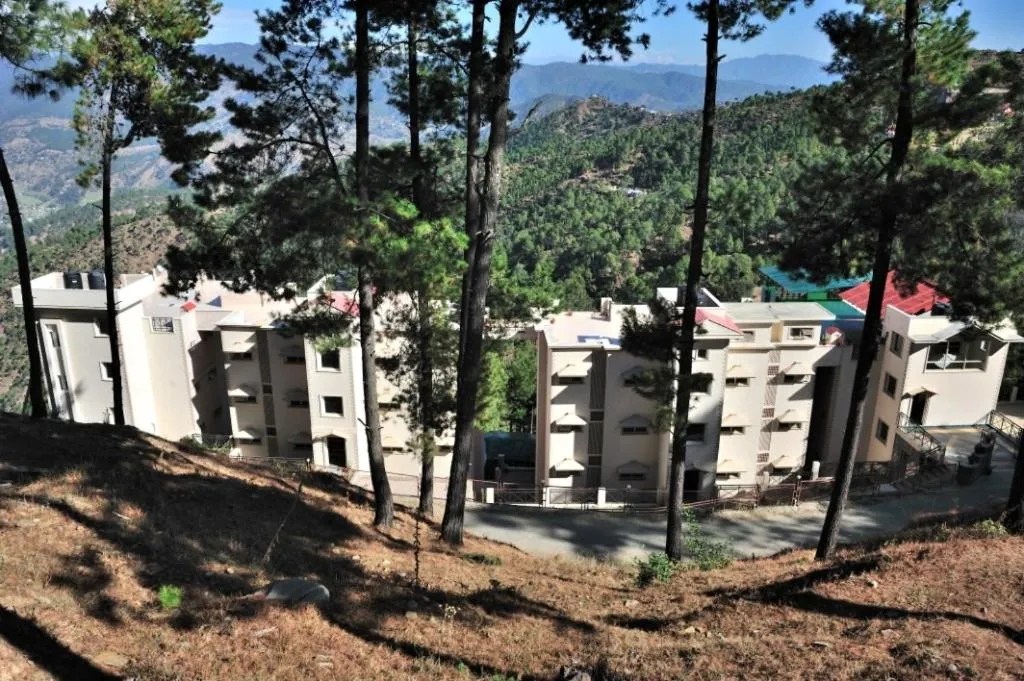 Property building in Woodsvilla Residency Ranikhet