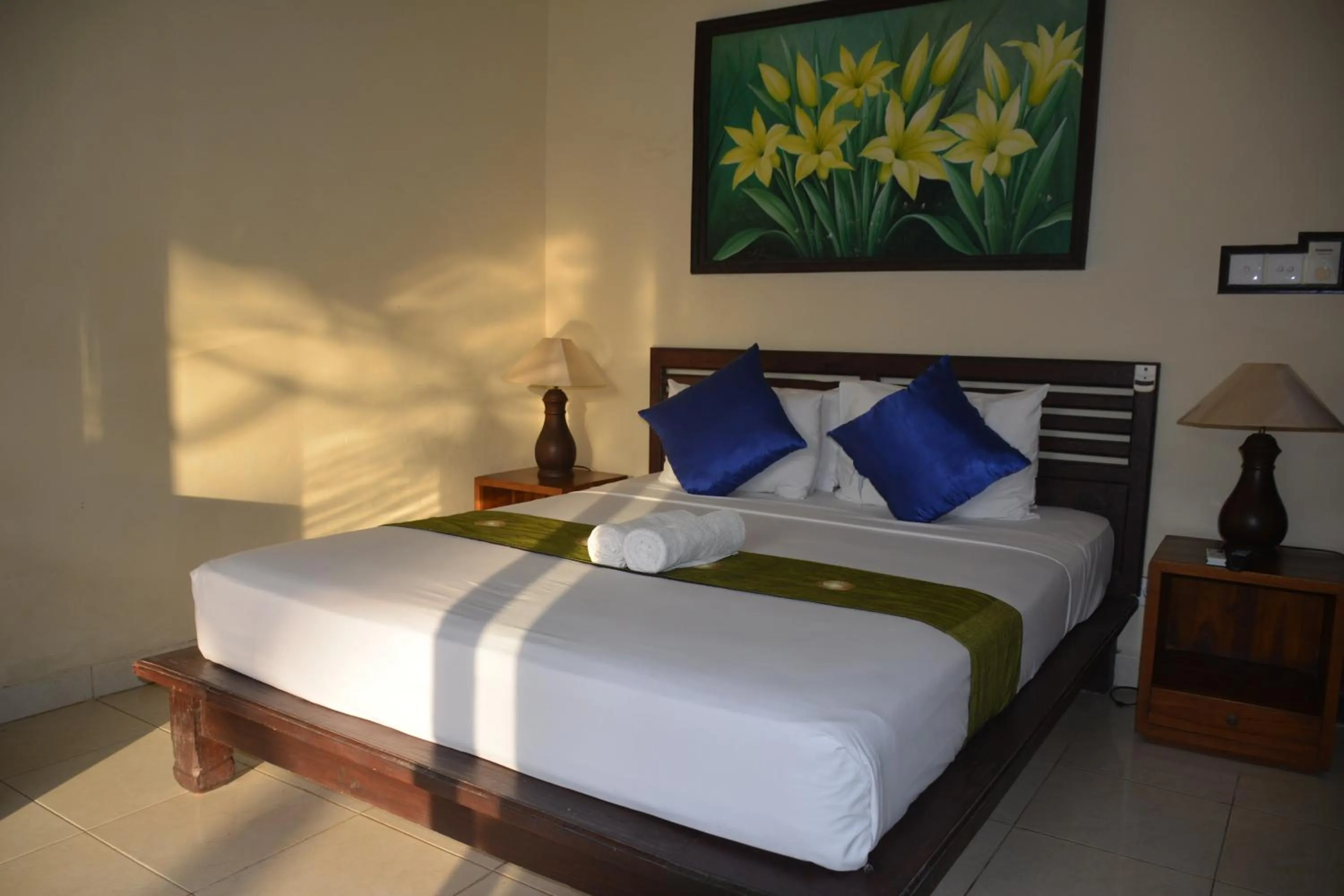 Bed in Segara Wangi Beach Cottages