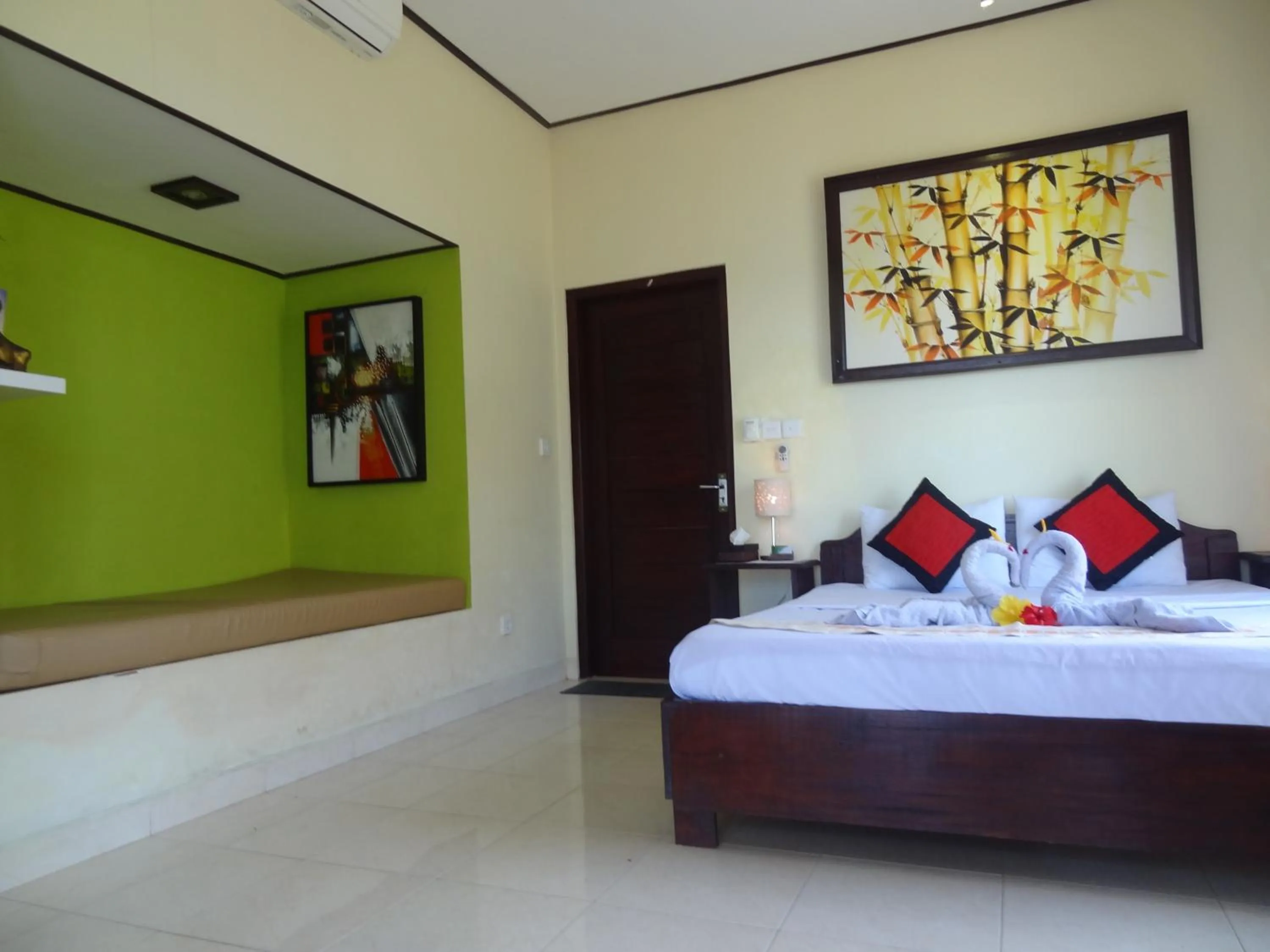 Bed in Segara Wangi Beach Cottages