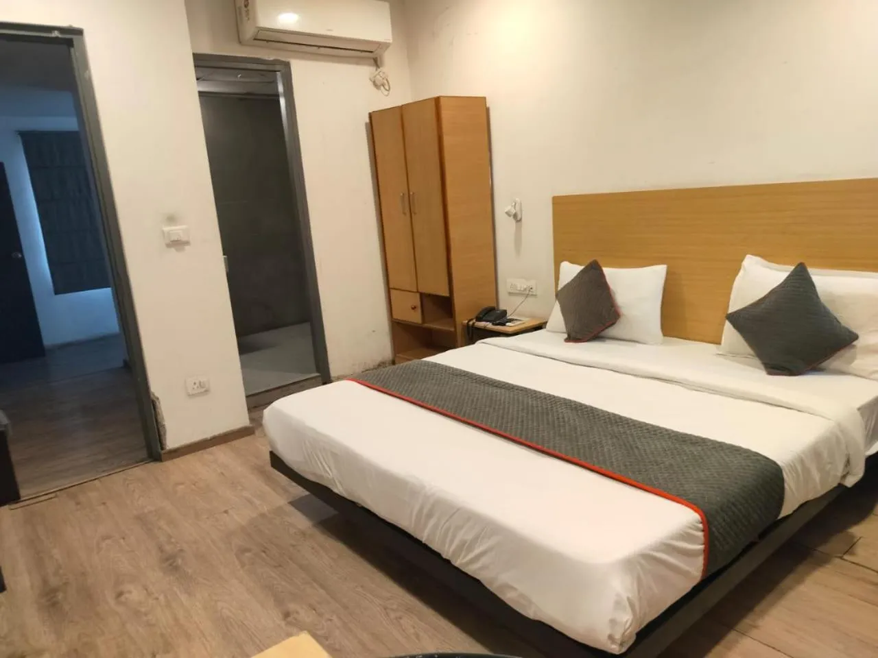 Bed in SwagStay Hotel Century, Nagpur