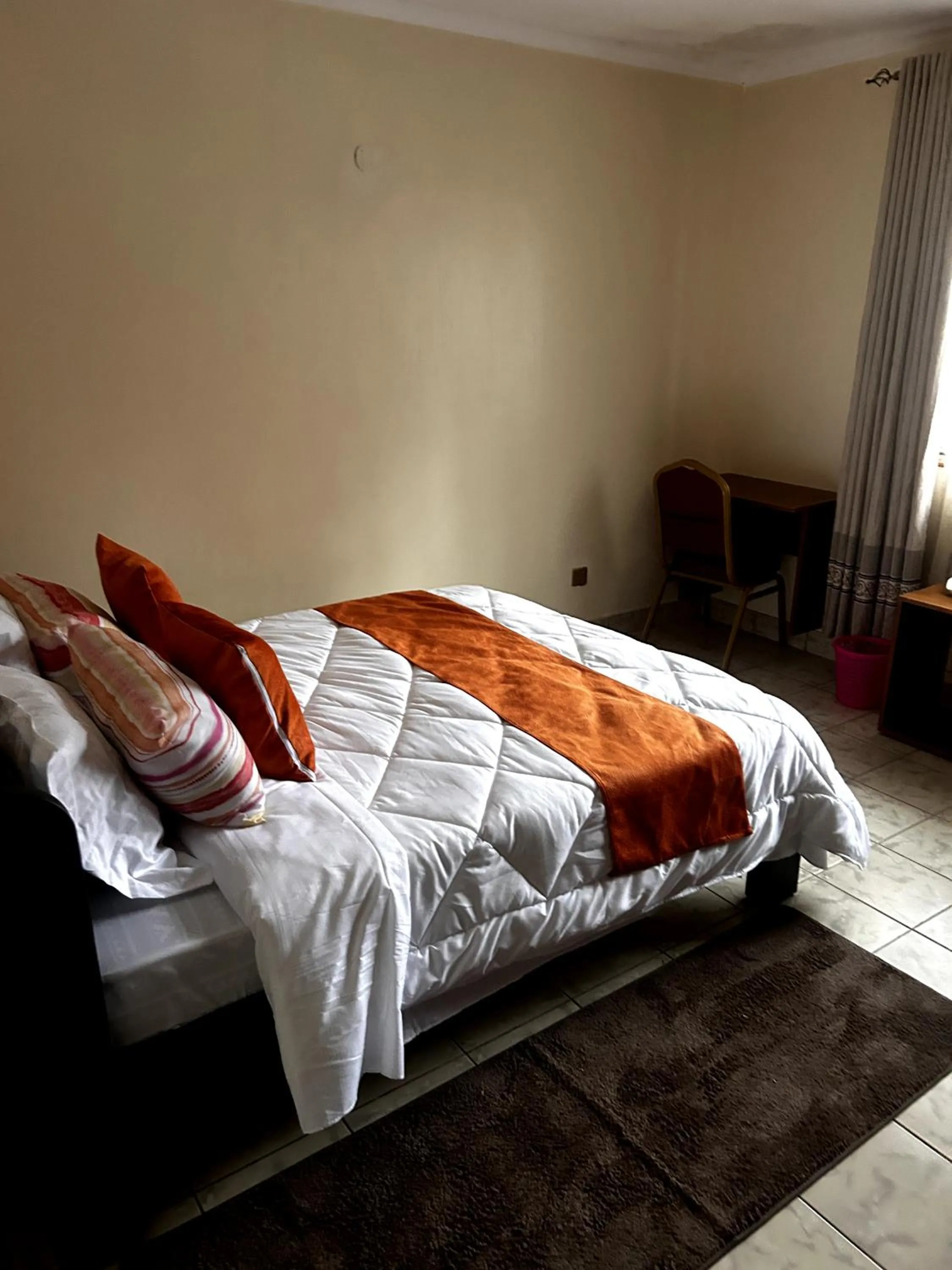 Bed in Axis Guest House