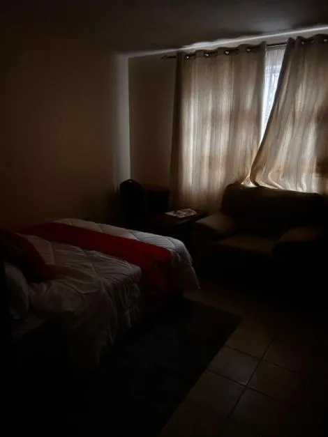 Bed in Axis Guest House