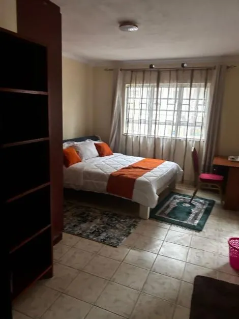 Bed in Axis Guest House