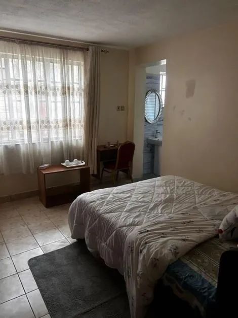 Bed in Axis Guest House