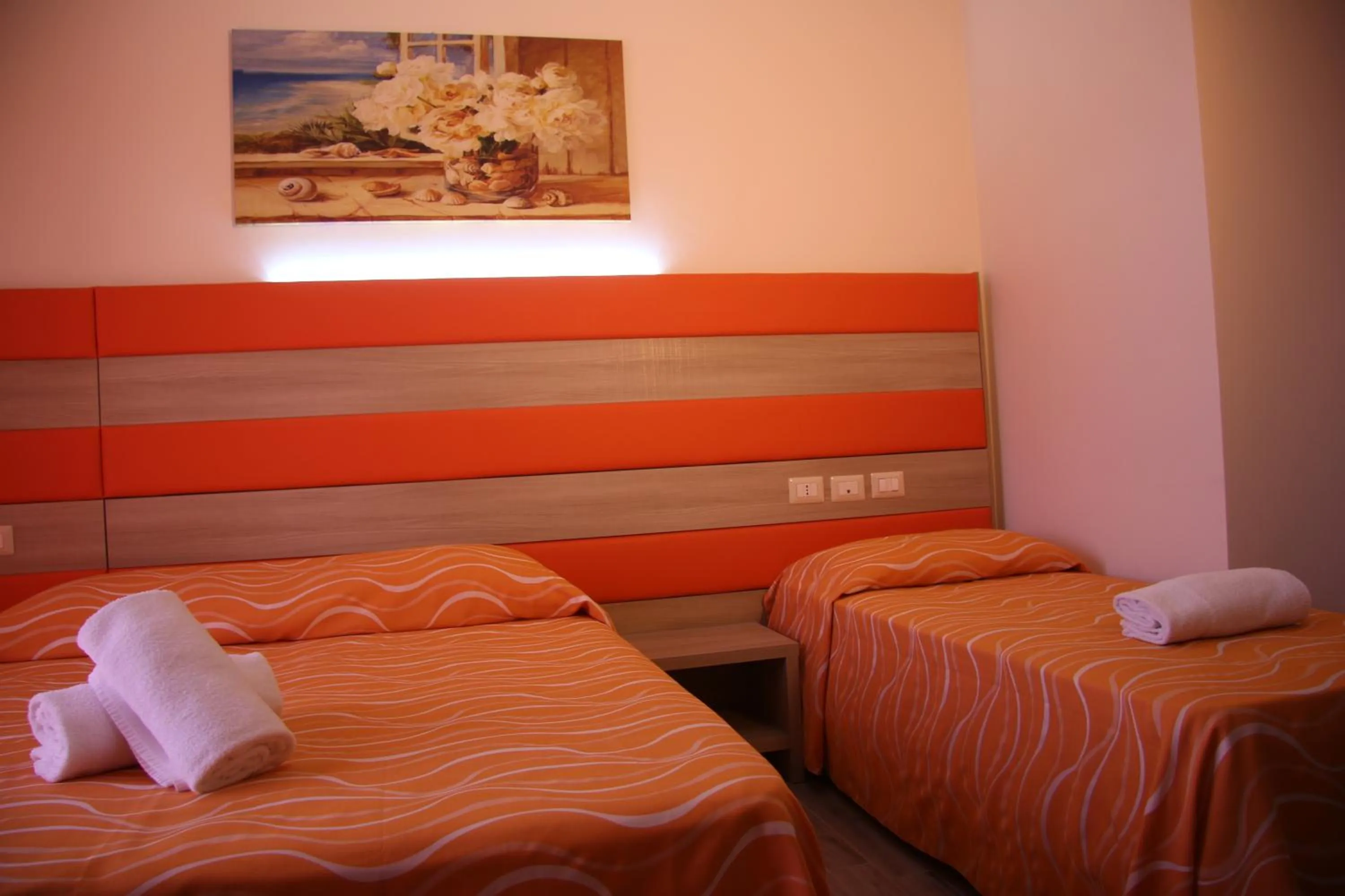 Bed in ChrisMare Hotel