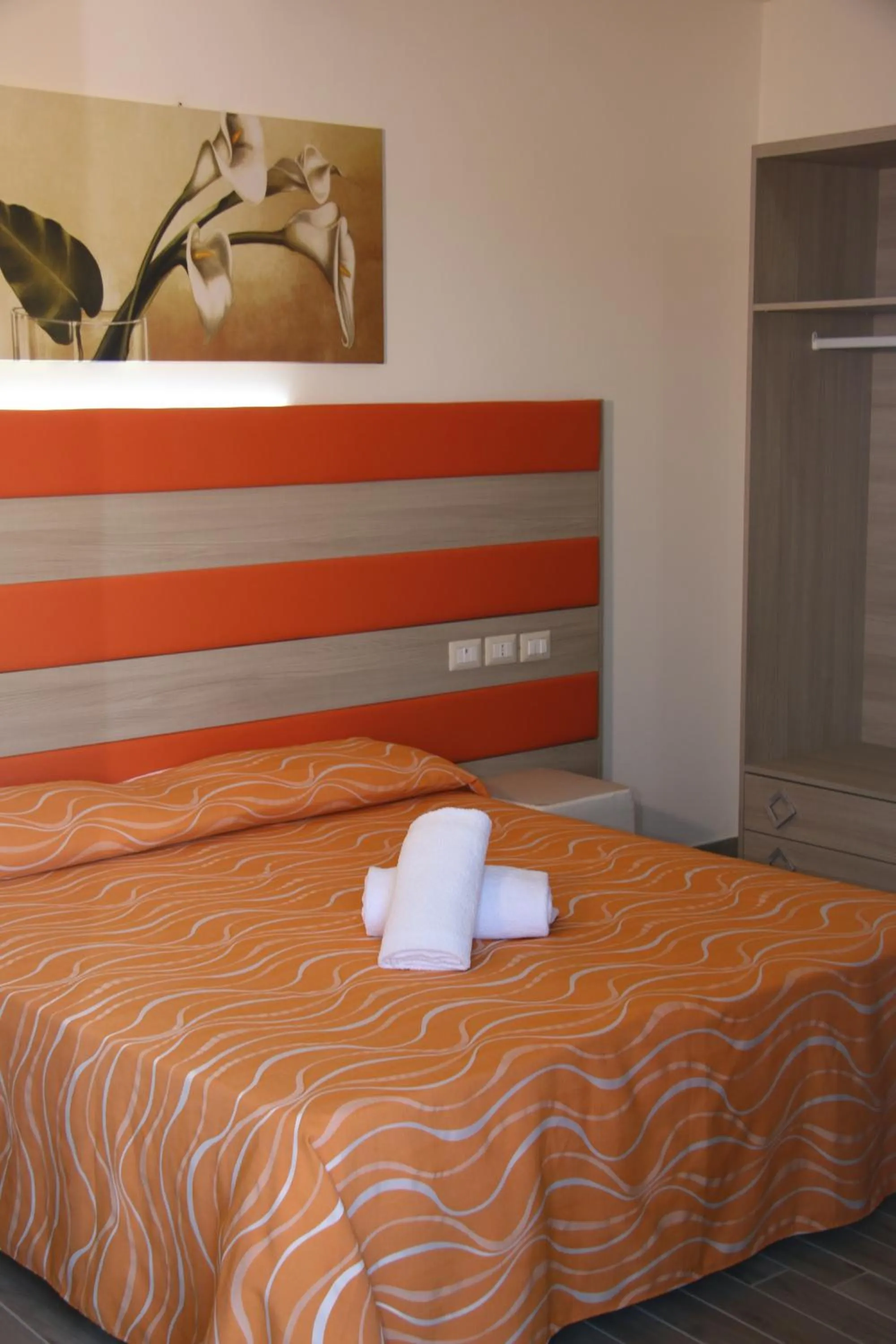 Bed in ChrisMare Hotel