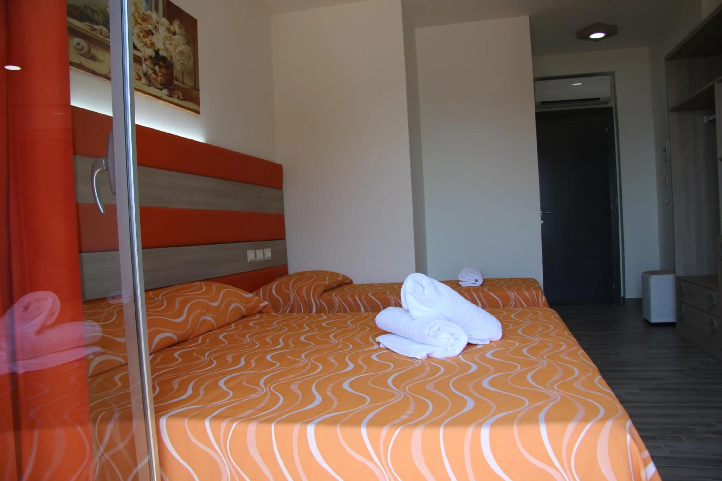 Bed in ChrisMare Hotel