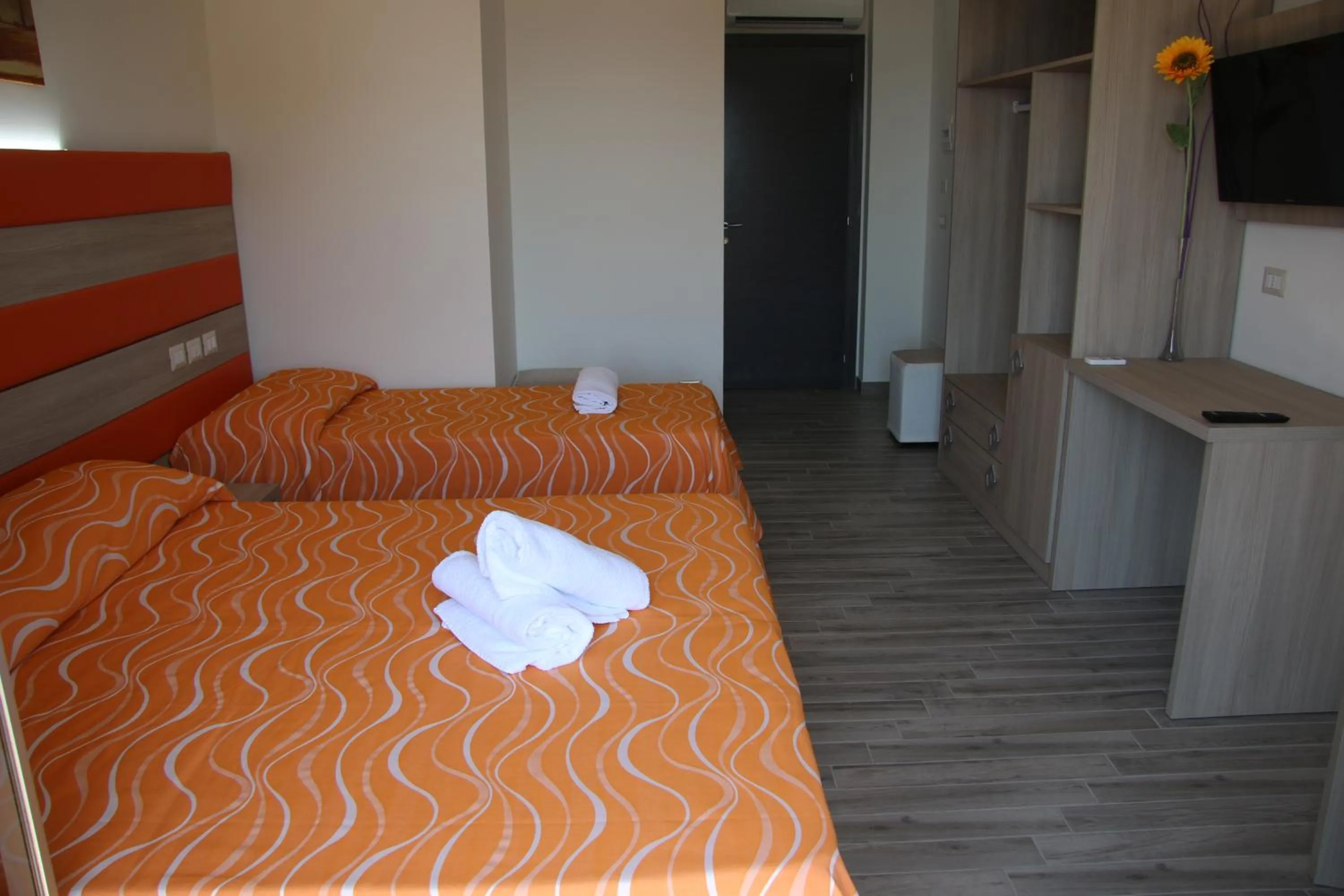 Bed in ChrisMare Hotel