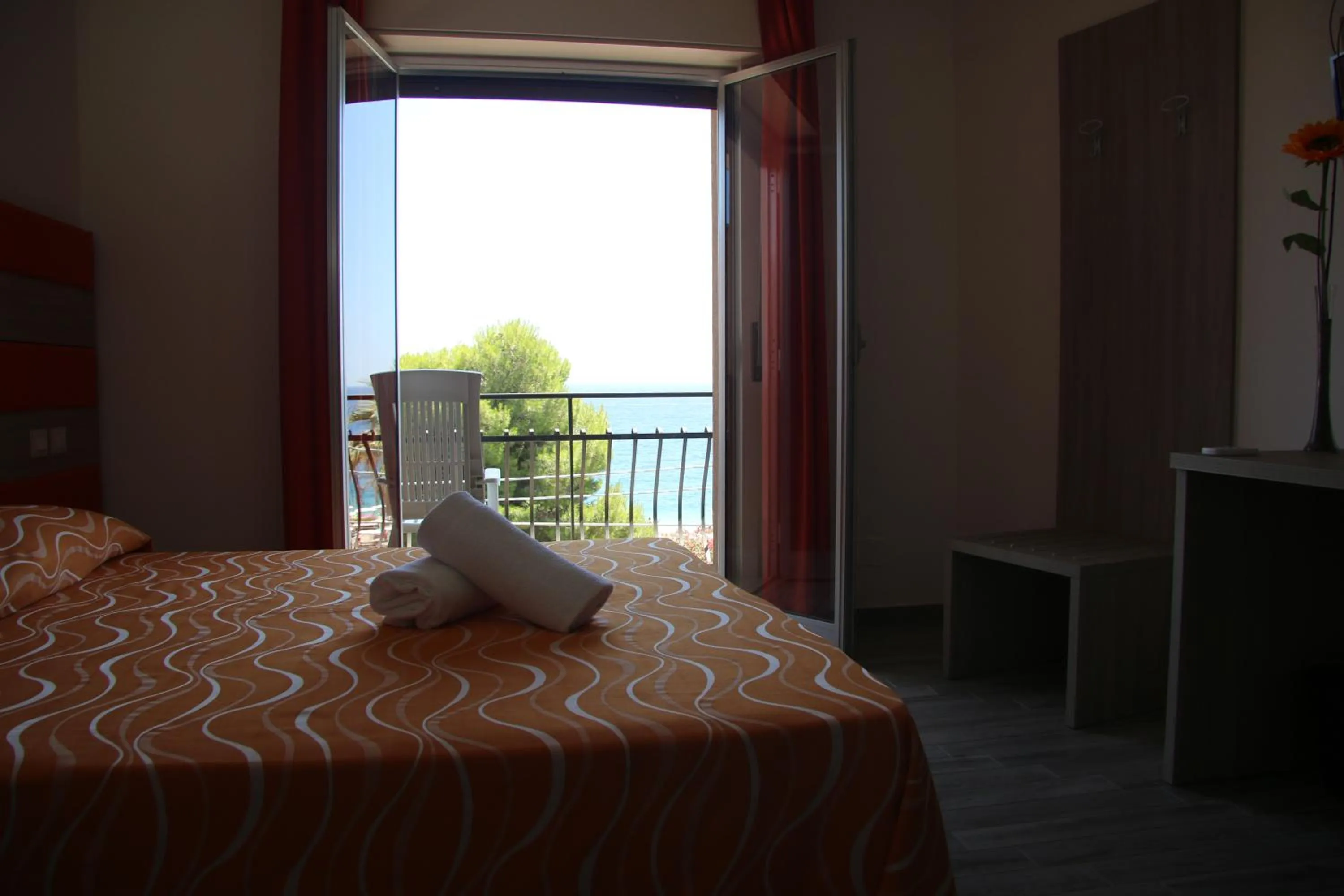 Bed in ChrisMare Hotel